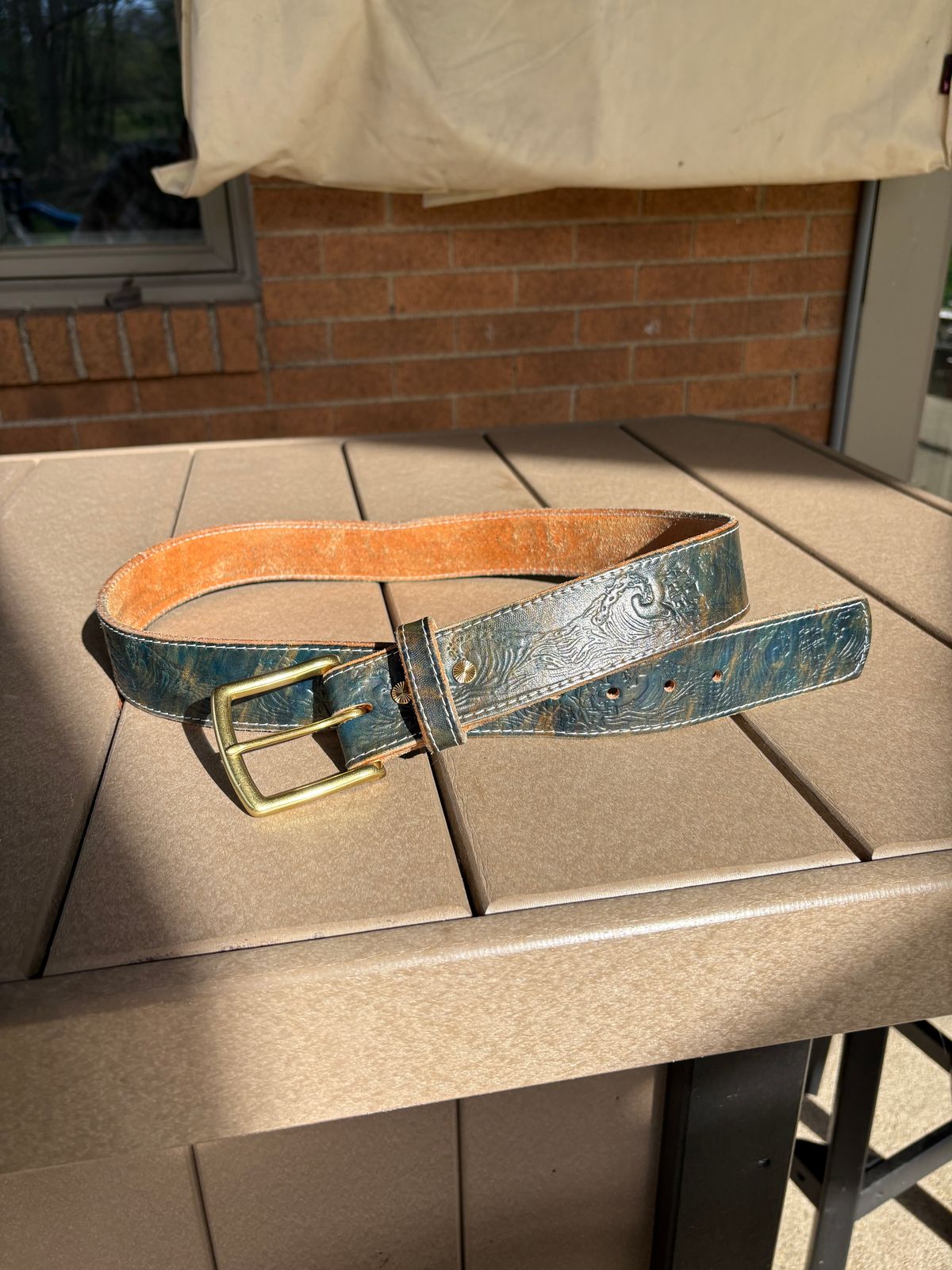 Photo by kablamb11 on April 3, 2026 of the Harker Leatherworks Squall Belt in Marbled Blue Overdyed Wickett and Craig Bridle.
