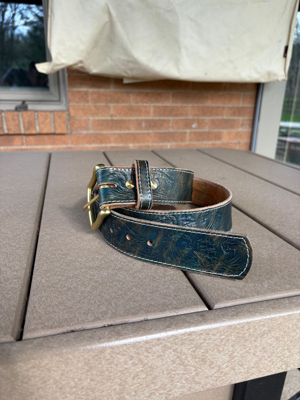 Photo by kablamb11 on April 3, 2026 of the Harker Leatherworks Squall Belt in Marbled Blue Overdyed Wickett and Craig Bridle.
