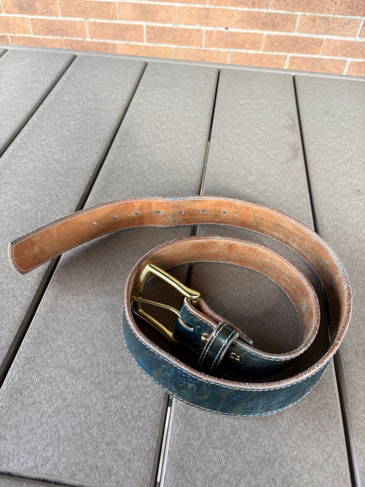 Photo by kablamb11 on April 3, 2026 of the Harker Leatherworks Squall Belt in Marbled Blue Overdyed Wickett and Craig Bridle.
