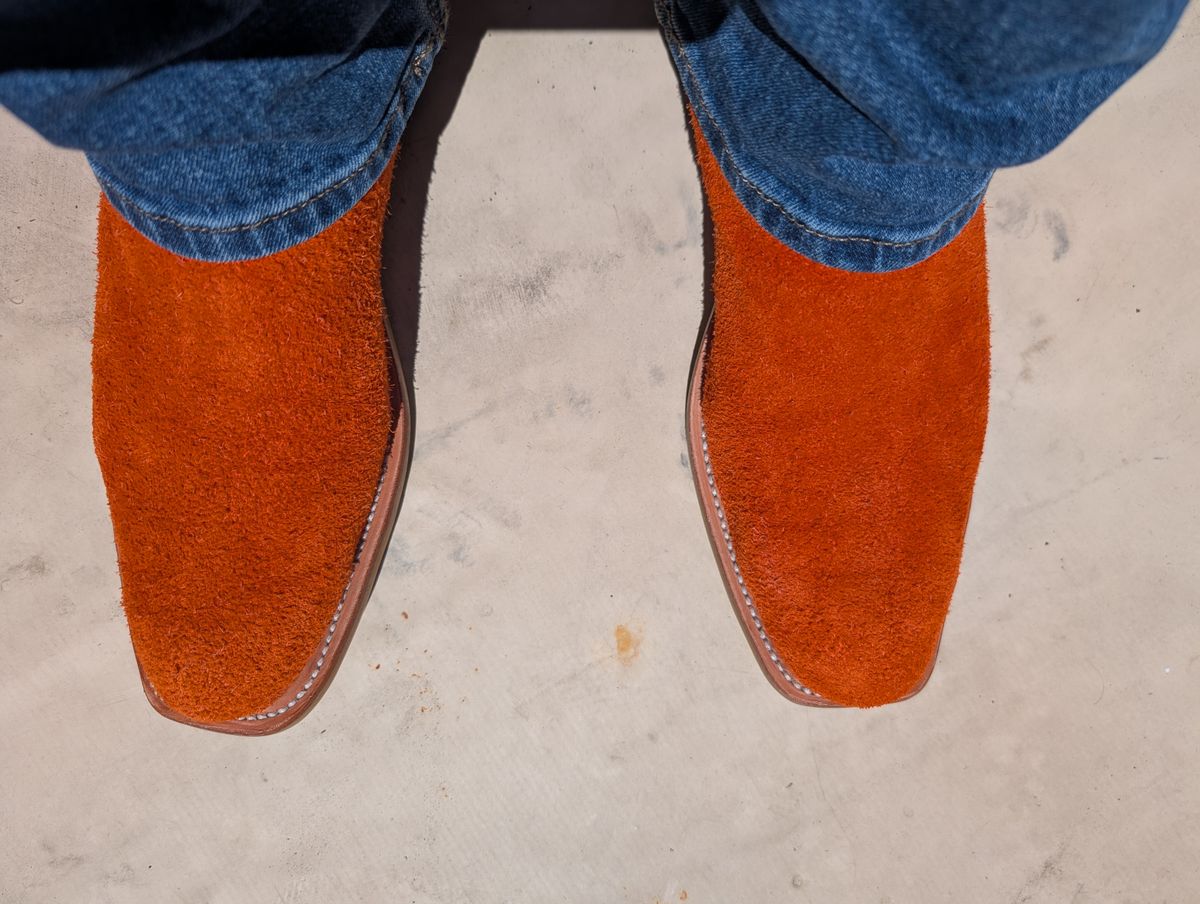 Photo by alkemest on July 3, 2025 of the Fenoglio Orange Roughout With Black Smooth Italian Uppers, Outpost Western Exclusive in Fenoglio Orange Roughout.