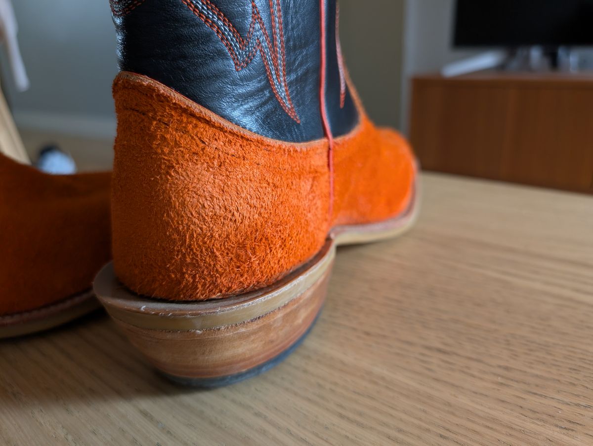 Photo by alkemest on July 9, 2025 of the Fenoglio Orange Roughout With Black Smooth Italian Uppers, Outpost Western Exclusive in Fenoglio Orange Roughout.