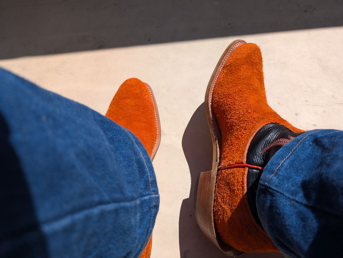 Photo by alkemest on August 14, 2025 of the Fenoglio Orange Roughout With Black Smooth Italian Uppers, Outpost Western Exclusive in Fenoglio Orange Roughout.