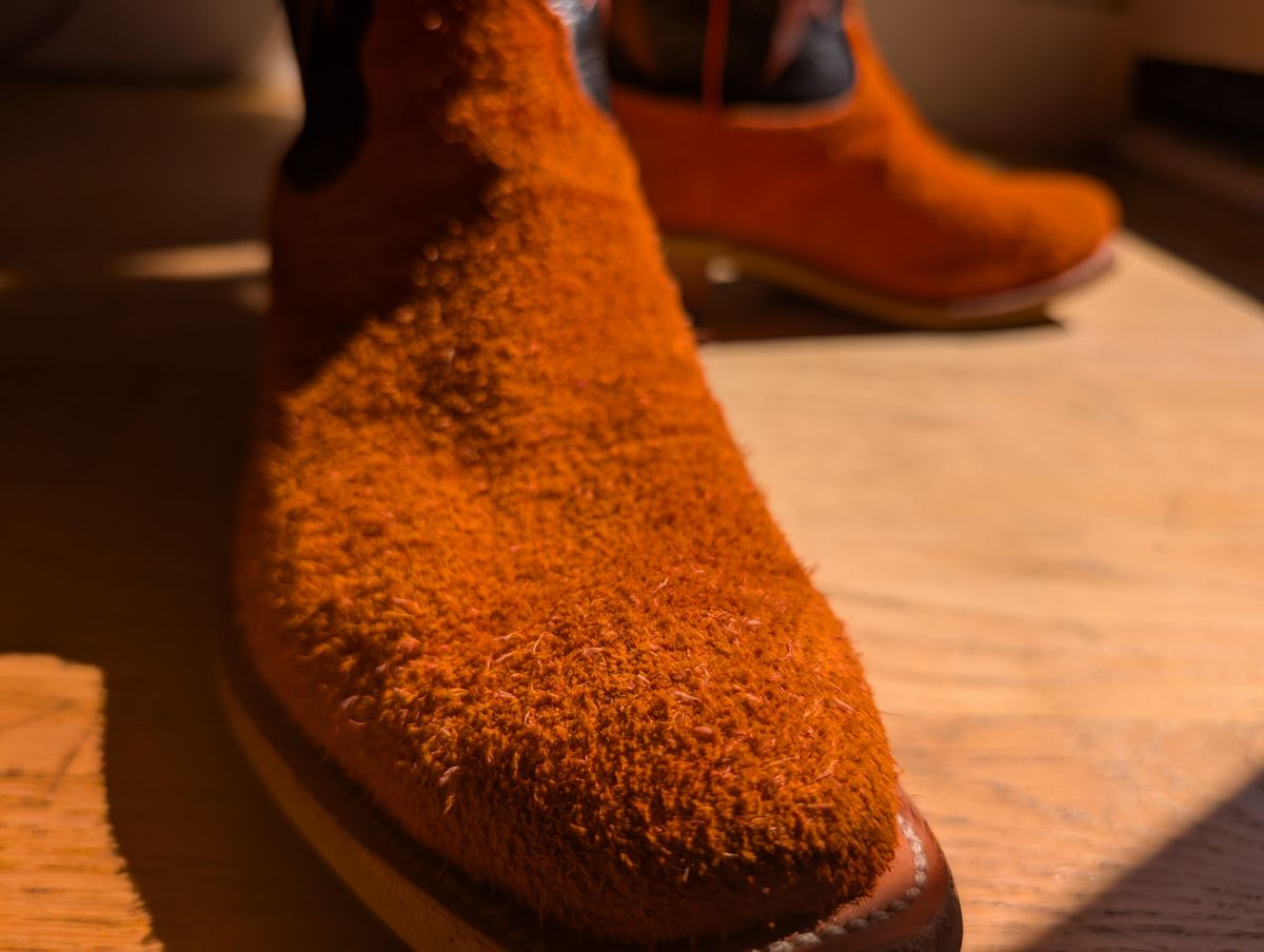 Photo by alkemest on August 22, 2025 of the Fenoglio Orange Roughout With Black Smooth Italian Uppers, Outpost Western Exclusive in Fenoglio Orange Roughout.