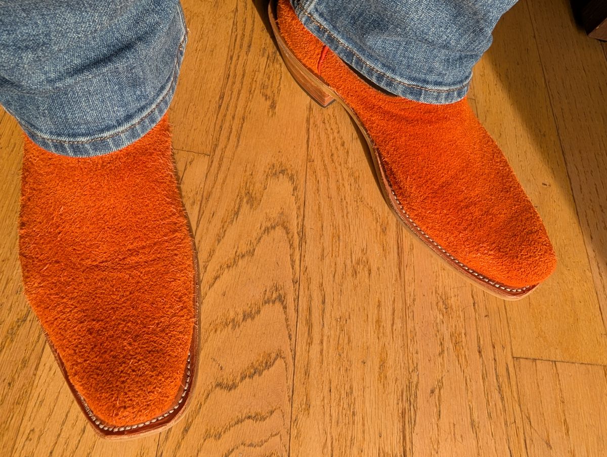 Photo by alkemest on November 2, 2025 of the Fenoglio Orange Roughout With Black Smooth Italian Uppers, Outpost Western Exclusive in Fenoglio Orange Roughout.