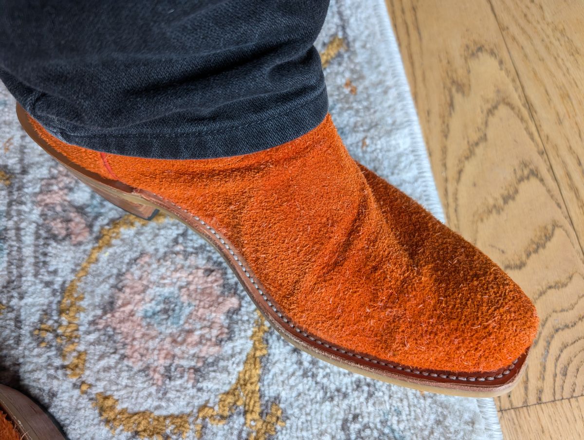 Photo by alkemest on November 24, 2025 of the Fenoglio Orange Roughout With Black Smooth Italian Uppers, Outpost Western Exclusive in Fenoglio Orange Roughout.