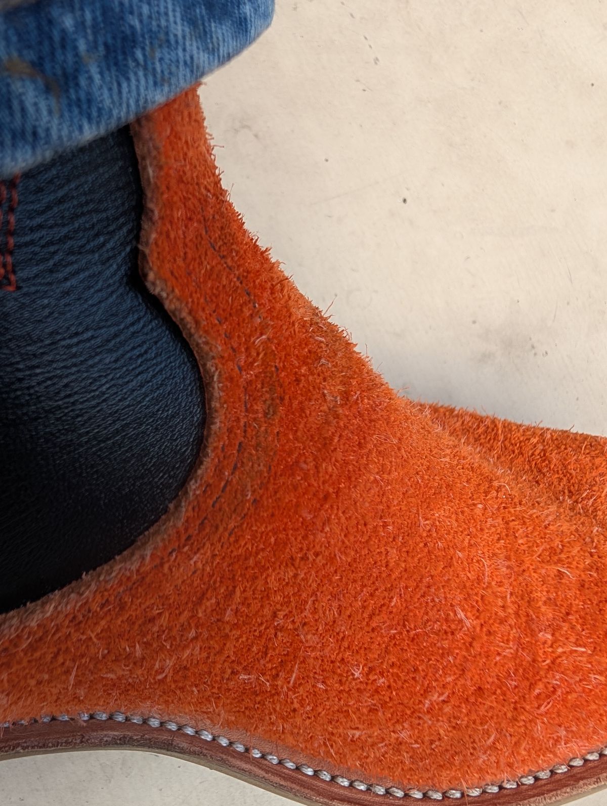 Photo by alkemest on February 25, 2026 of the Fenoglio Orange Roughout With Black Smooth Italian Uppers, Outpost Western Exclusive in Fenoglio Orange Roughout.