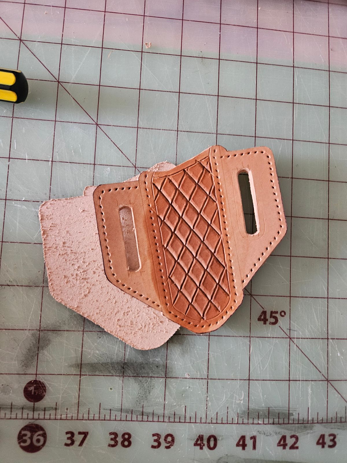 Photo by Jakesleather1505 on April 12, 2025 of the Self Made Buck 112 Belt Sheath in 5oz Veg Tan.