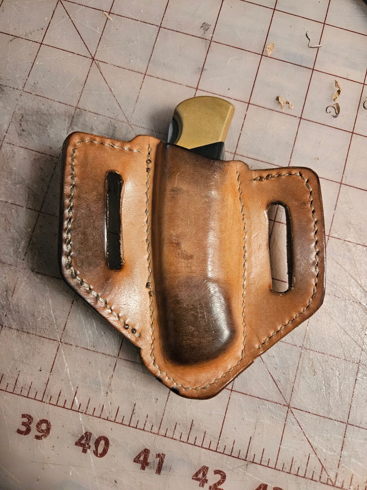 Photo by Jakesleather1505 on September 30, 2025 of the Self Made Buck 112 Belt Sheath in 5oz Veg Tan.