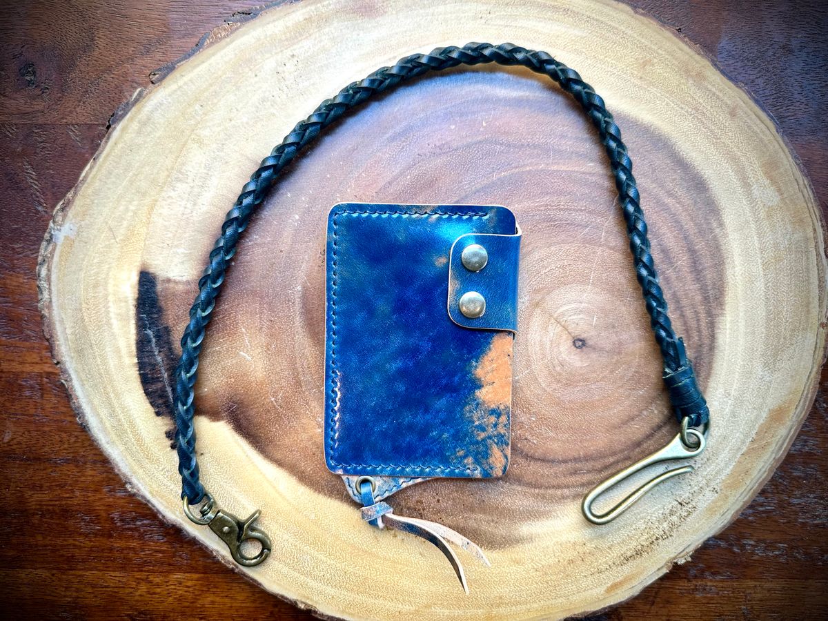 Photo by Suited_n_Booted on June 22, 2026 of the Toro Negro Leather Goods (Ukraine) Minimalist Biker Wallet in Rocado Marble Blue Shell Cordovan.
