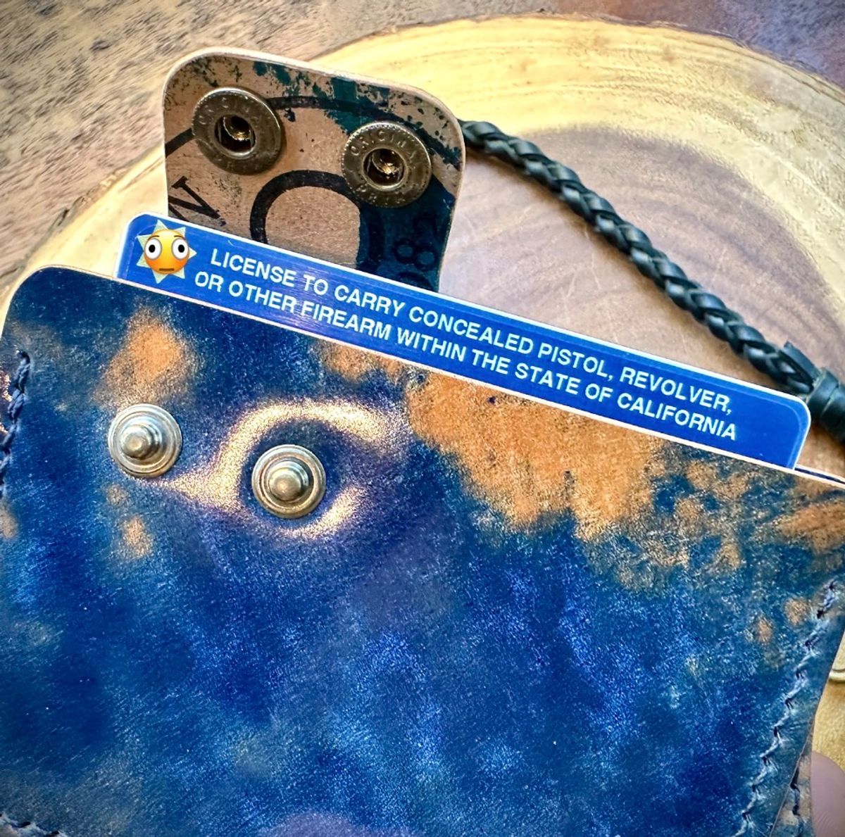 Photo by Suited_n_Booted on June 22, 2026 of the Toro Negro Leather Goods (Ukraine) Minimalist Biker Wallet in Rocado Marble Blue Shell Cordovan.