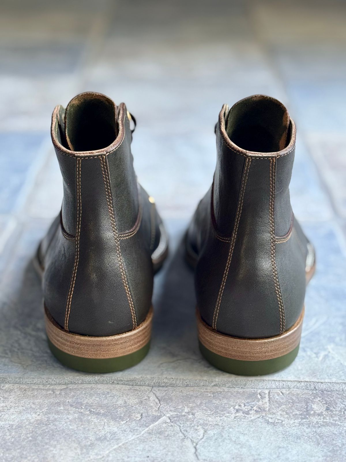 Photo by ScuffedUpKicks on October 2, 2025 of the Iron Boots x Østmo Type 1 in Maryam Dark Green Hand-Dyed Horsehide.