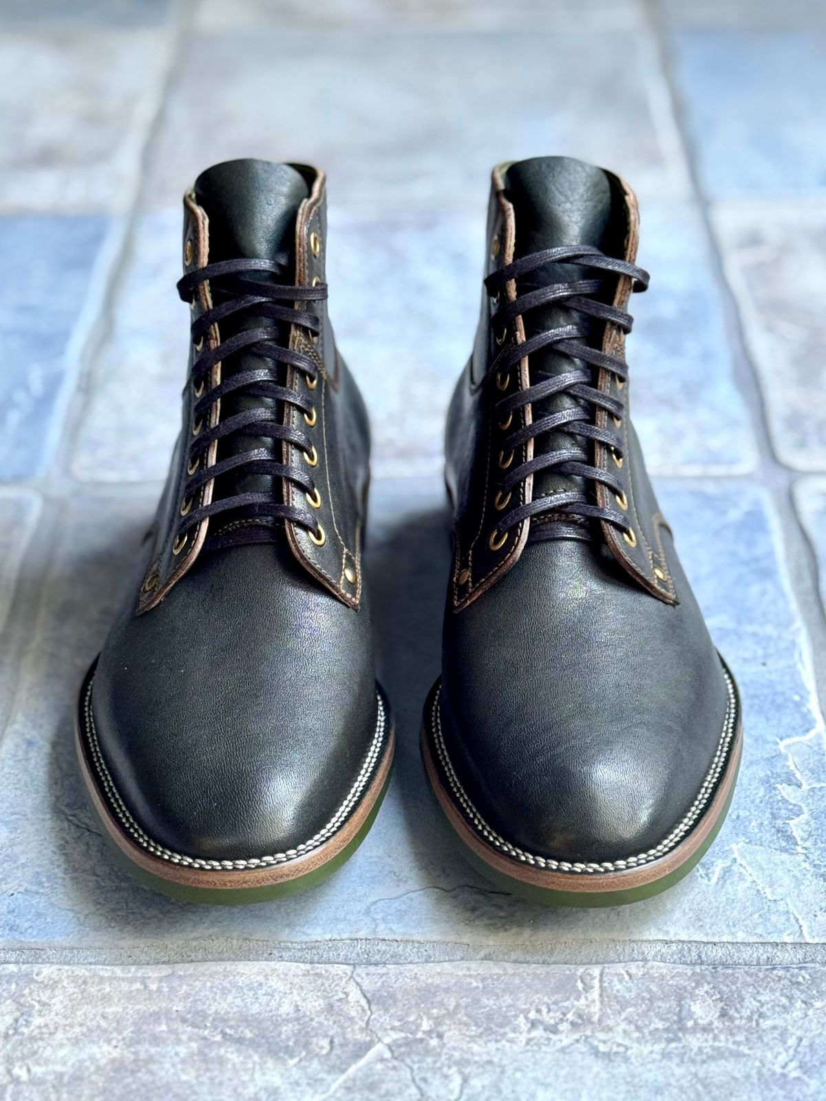 Photo by ScuffedUpKicks on October 2, 2025 of the Iron Boots x Østmo Type 1 in Maryam Dark Green Hand-Dyed Horsehide.