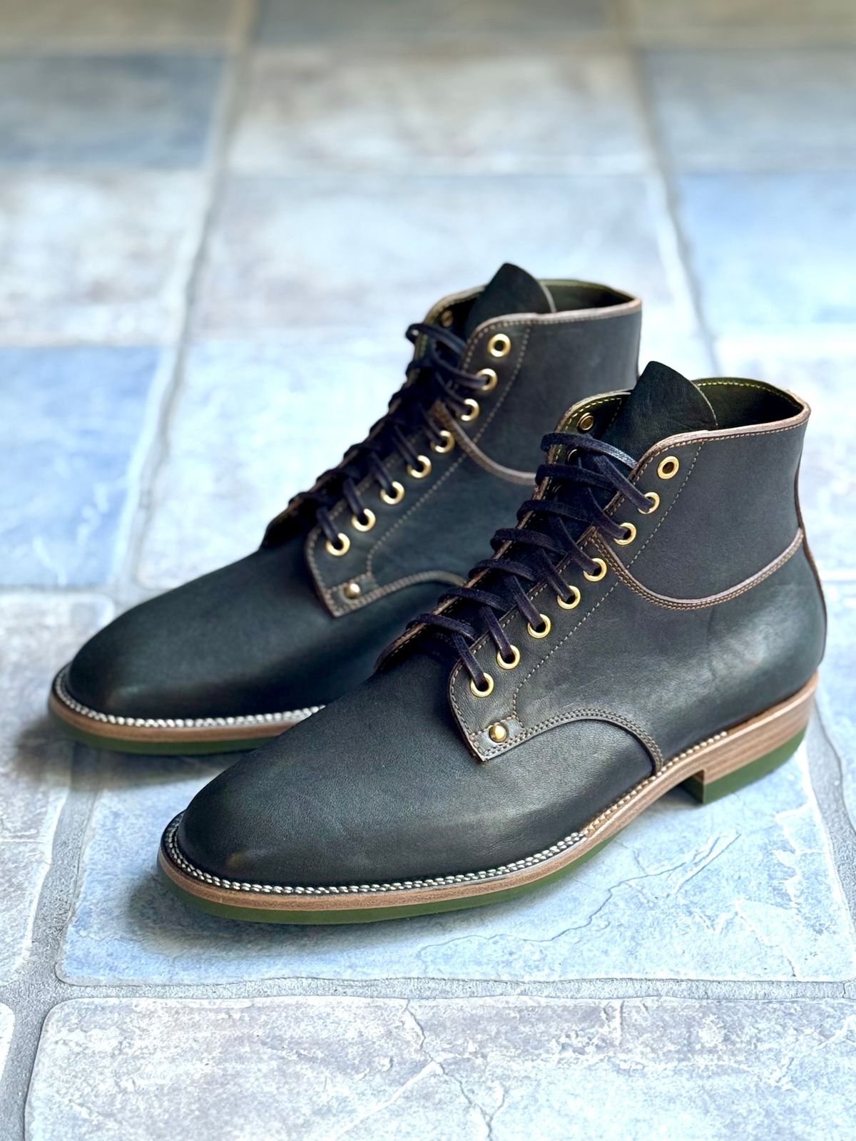 Photo by ScuffedUpKicks on October 2, 2025 of the Iron Boots x Østmo Type 1 in Maryam Dark Green Hand-Dyed Horsehide.