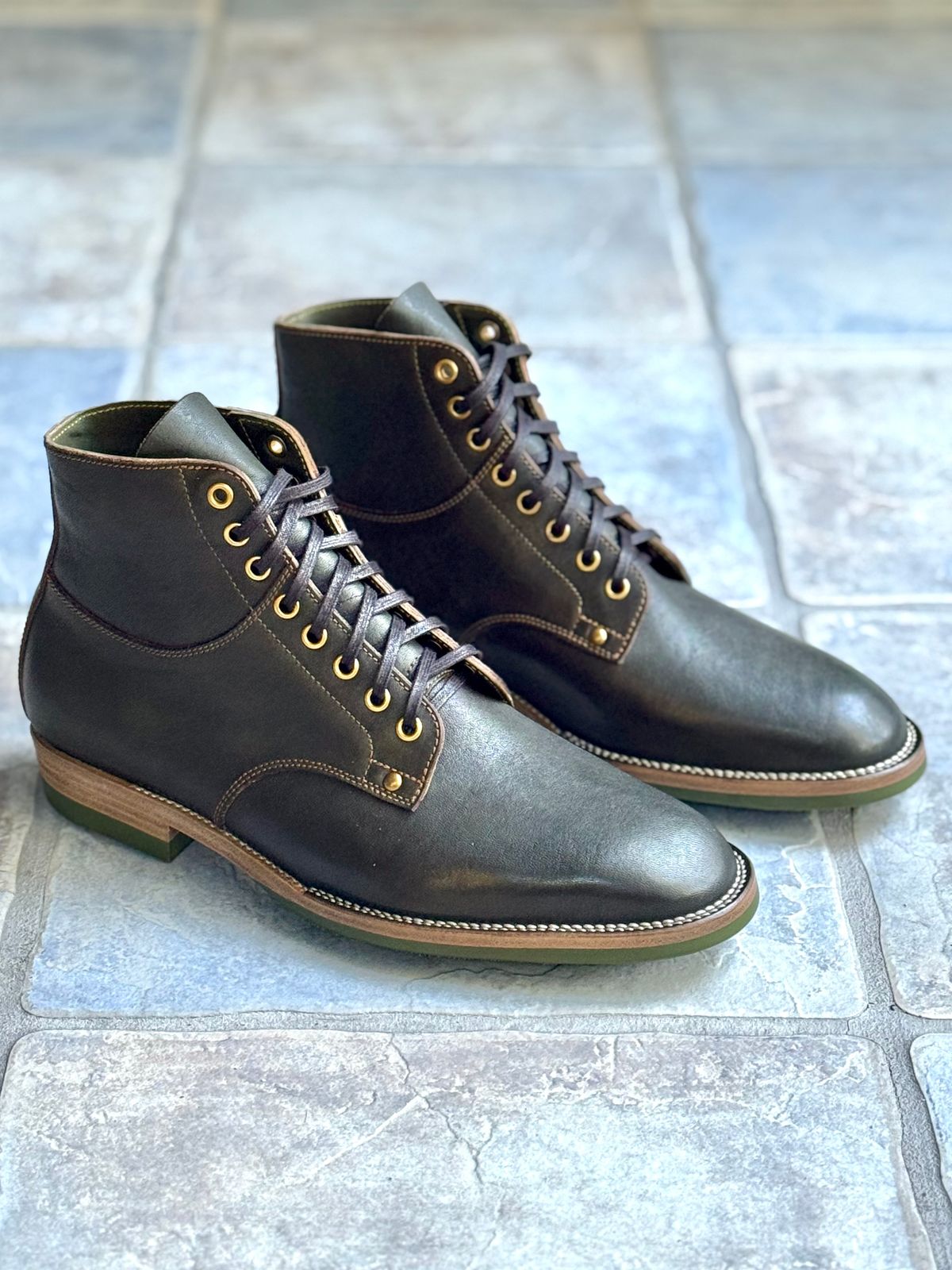 Photo by ScuffedUpKicks on October 2, 2025 of the Iron Boots x Østmo Type 1 in Maryam Dark Green Hand-Dyed Horsehide.
