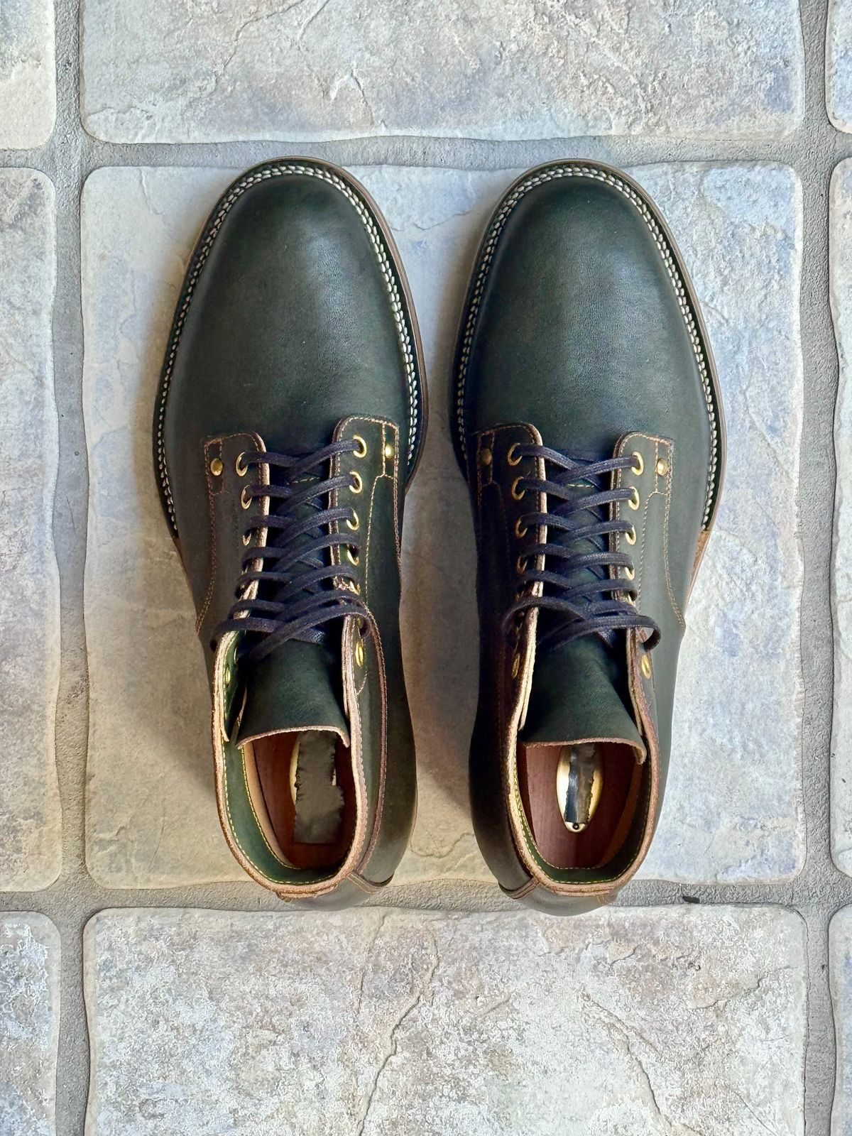 Photo by ScuffedUpKicks on October 2, 2025 of the Iron Boots x Østmo Type 1 in Maryam Dark Green Hand-Dyed Horsehide.