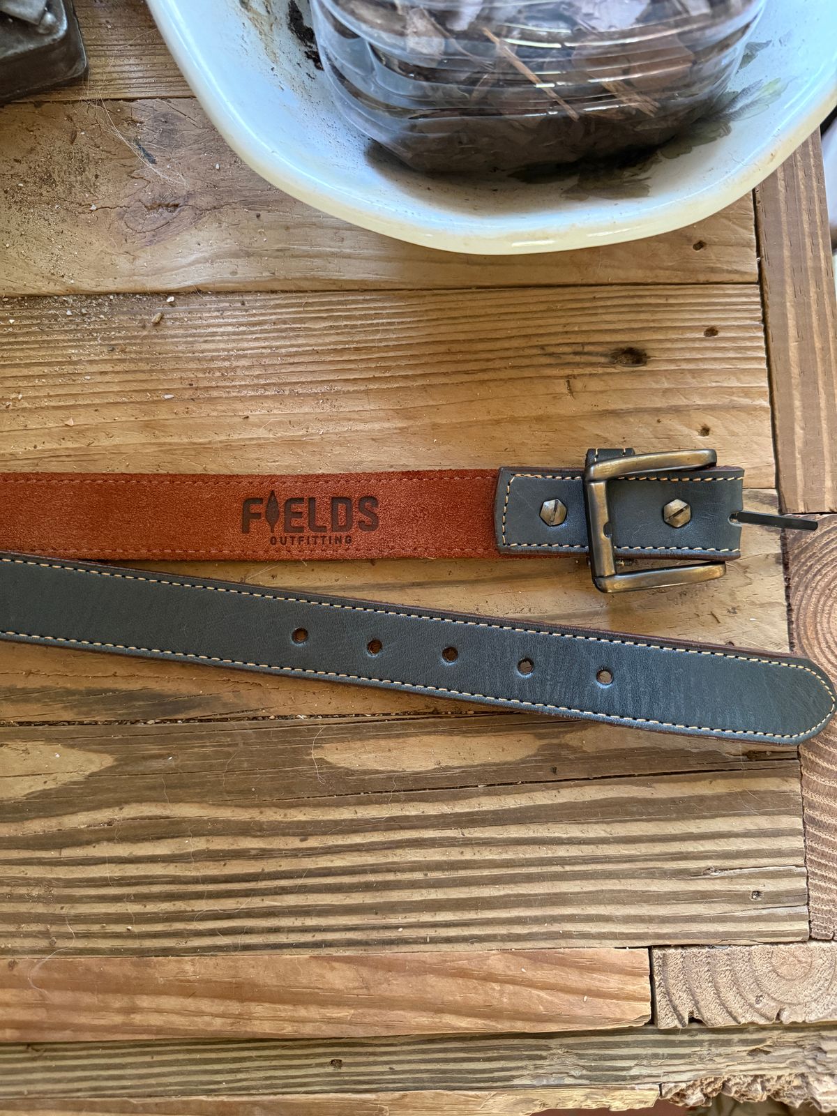 Photo by DinkyDog on October 3, 2025 of the Fields Outfitting Green Belt in Olive Argentinian Vegtable Tanned Leather.