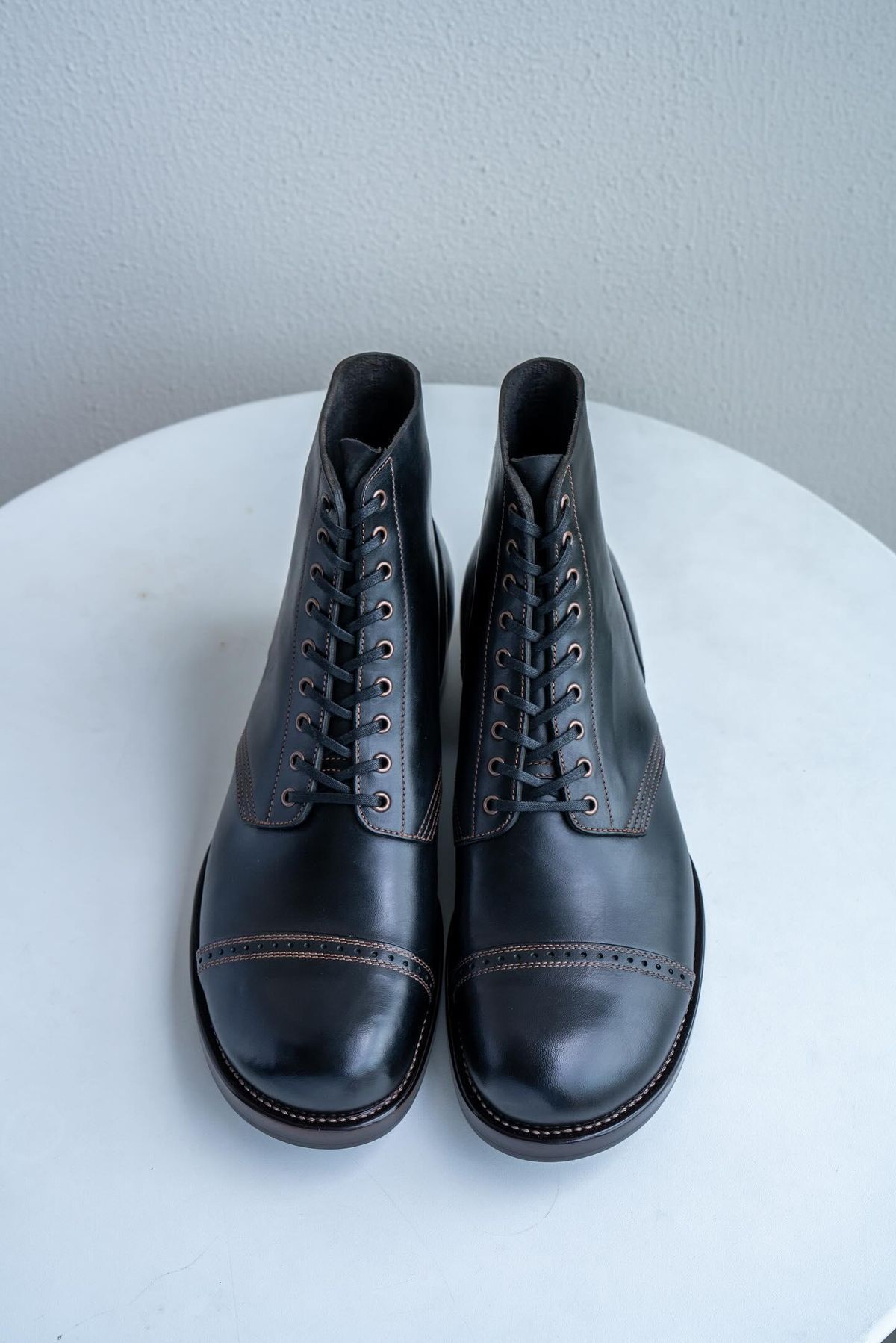 Photo by ryanpiyo on September 10, 2024 of the Nova Boots 40s Munson Combat Boots in Maryam Black Waxed Horsebutt.