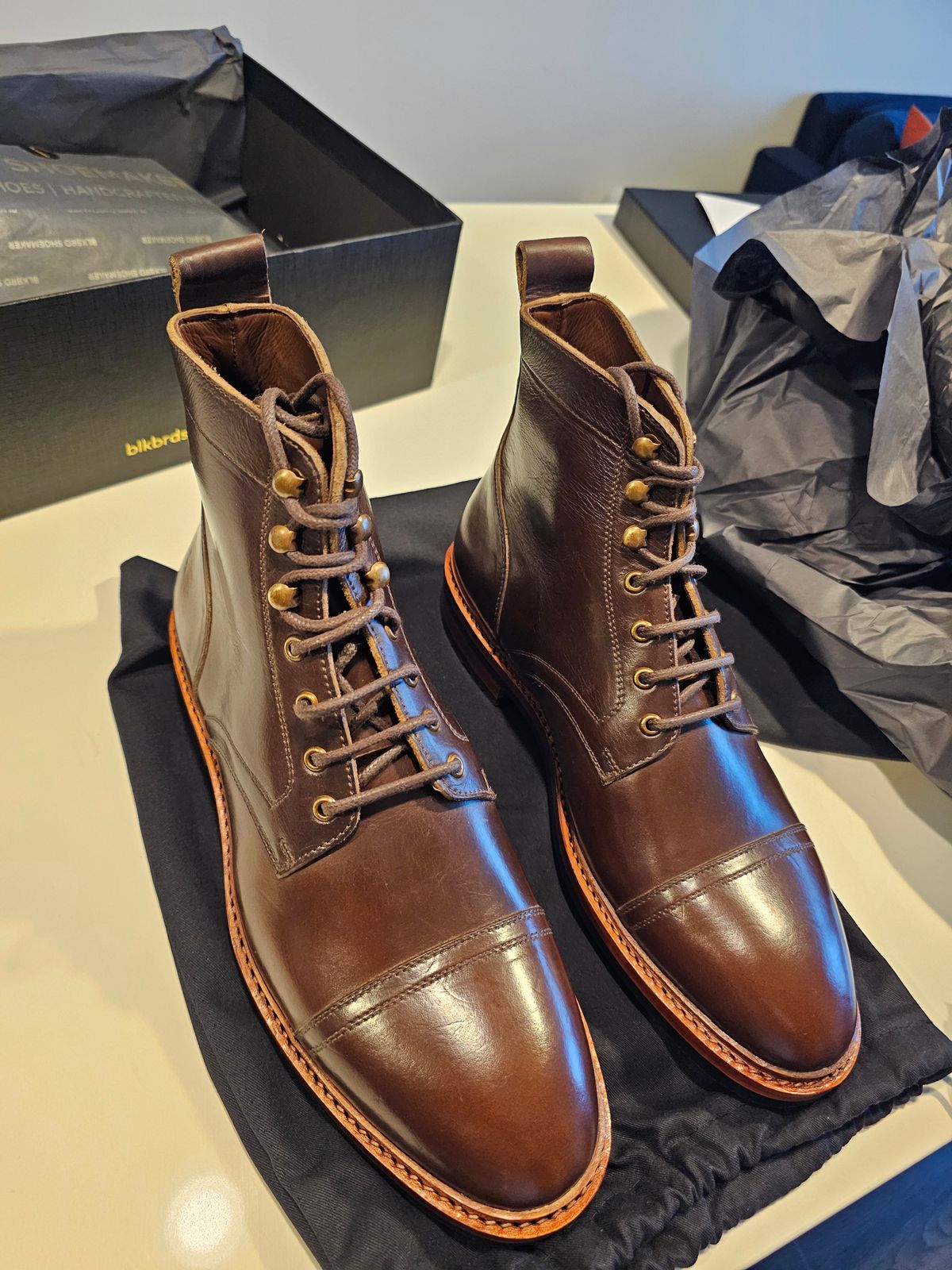Photo by rtikman87 on April 1, 2024 of the Blkbrd Shoemaker Dixon Cap Toe Derby Boot in Horween Brown Chromexcel.
