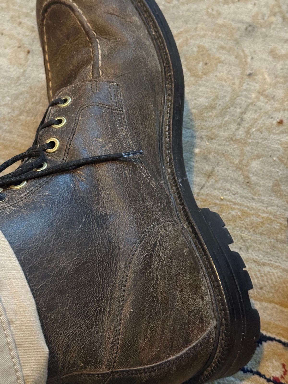 Photo by cabournmallory on July 3, 2025 of the Grant Stone Brass Boot in Black Waxed Deer.