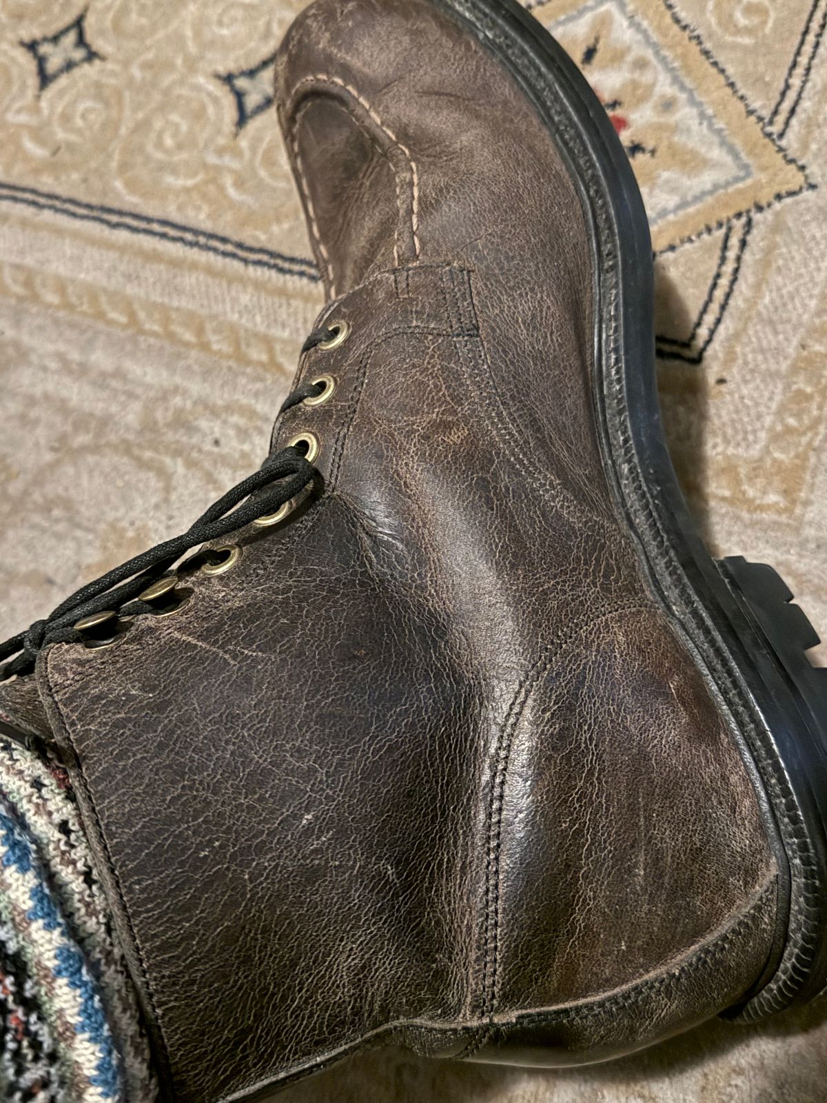 Photo by cabournmallory on November 8, 2025 of the Grant Stone Brass Boot in Black Waxed Deer.