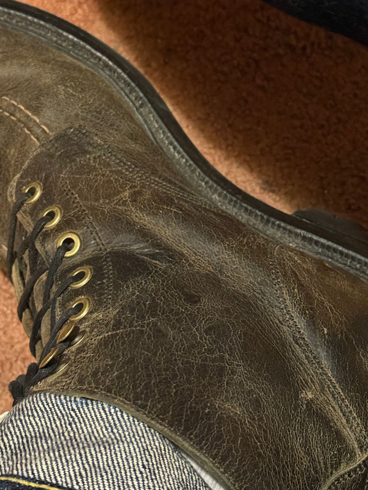 Photo by cabournmallory on December 1, 2025 of the Grant Stone Brass Boot in Black Waxed Deer.