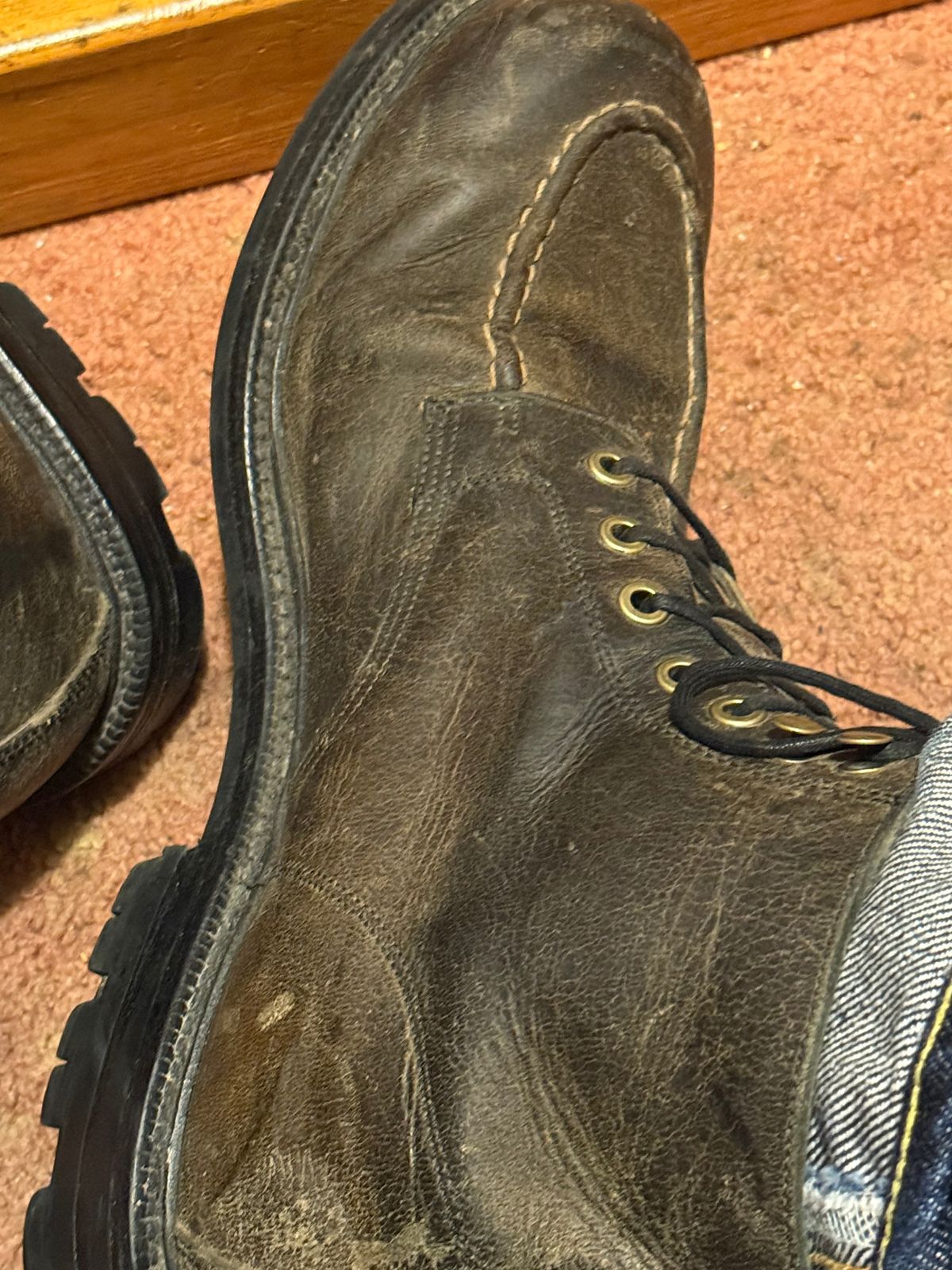 Photo by cabournmallory on December 1, 2025 of the Grant Stone Brass Boot in Black Waxed Deer.