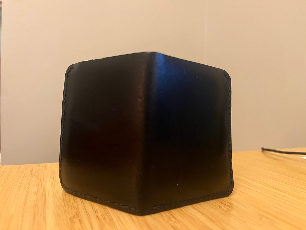 Photo by tomsbarkingdogs on January 6, 2026 of the One Star Leather Goods 6 Pocket Horizontal Learher Wallet in Horween Black/Yellow Buttero.