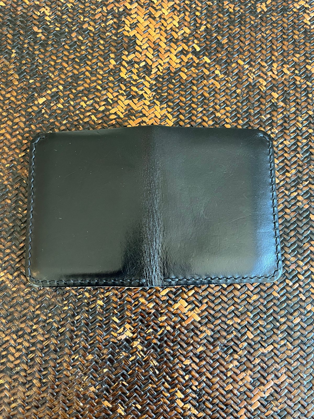 Photo by tomsbarkingdogs on April 5, 2026 of the One Star Leather Goods 6 Pocket Horizontal Learher Wallet in Horween Black/Yellow Buttero.