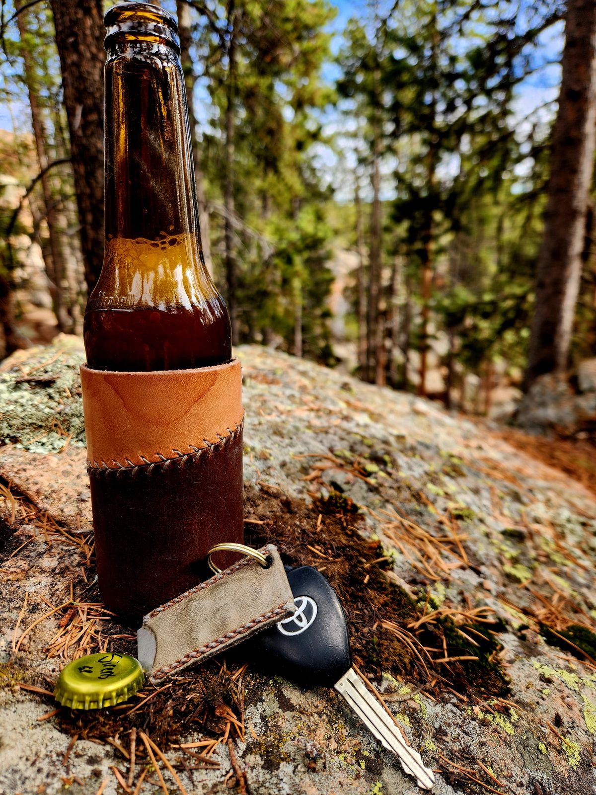 Photo by spyder550 on November 3, 2025 of the Self-Made Keychain/Bottle Opener in Wickett & Craig Grey Traditional Harness.