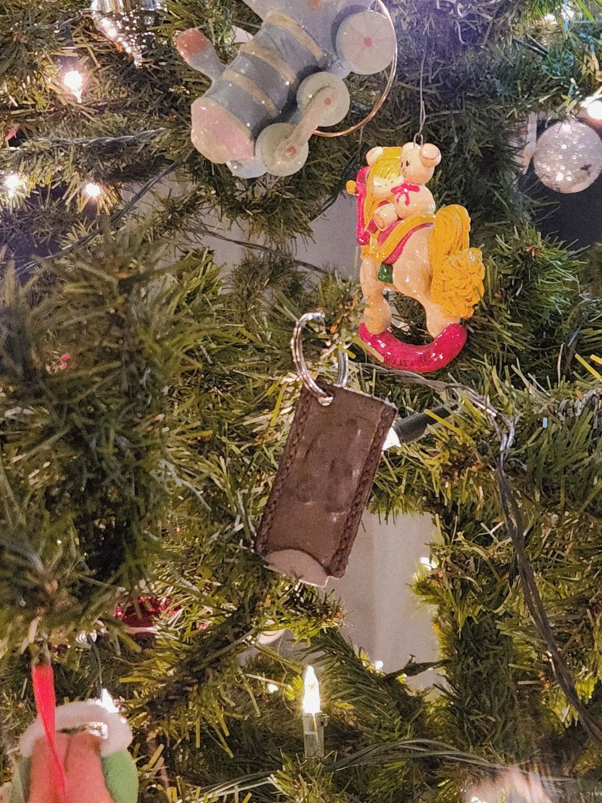 Photo by spyder550 on December 6, 2025 of the Self-Made Keychain/Bottle Opener in Wickett & Craig Grey Traditional Harness.