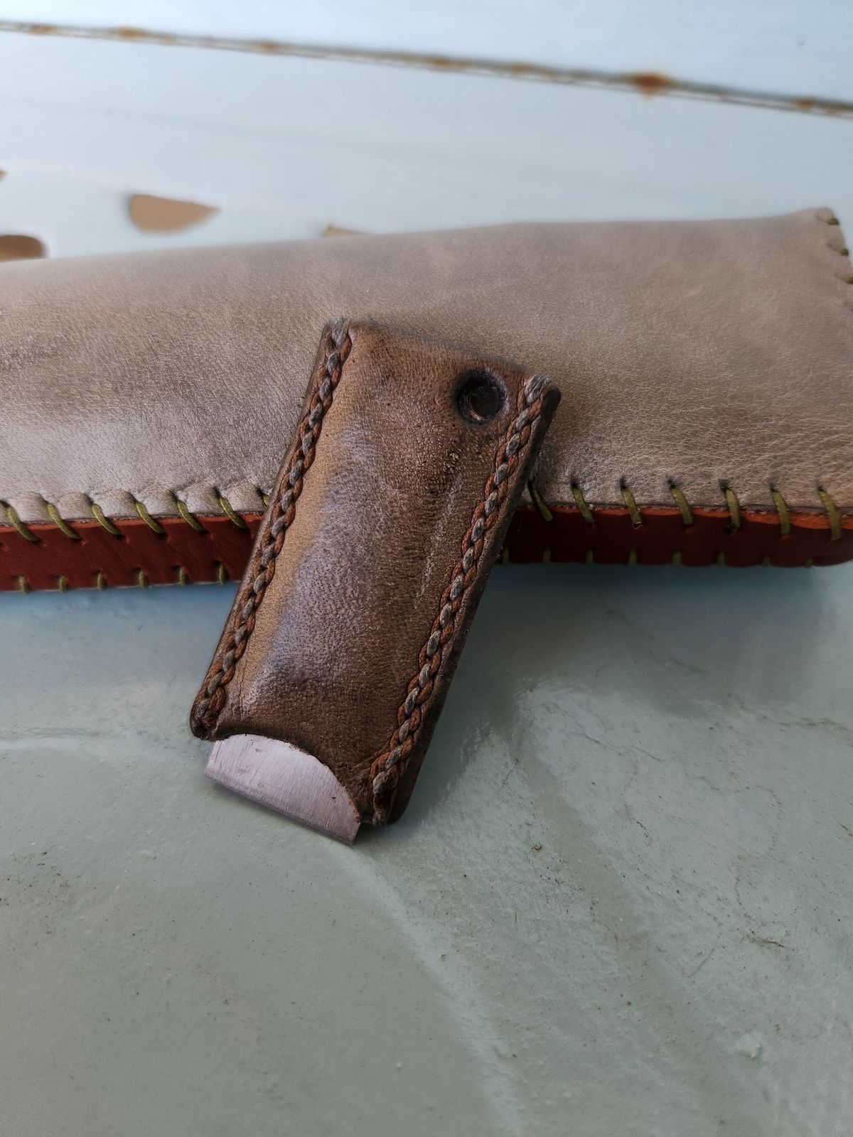 Photo by spyder550 on February 5, 2026 of the Self-Made Keychain/Bottle Opener in Wickett & Craig Grey Traditional Harness.