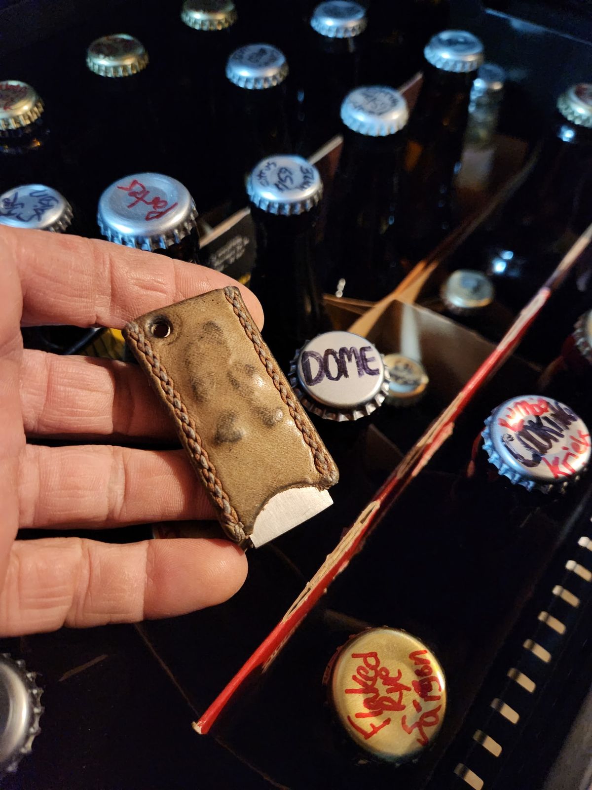 Photo by spyder550 on February 5, 2026 of the Self-Made Keychain/Bottle Opener in Wickett & Craig Grey Traditional Harness.