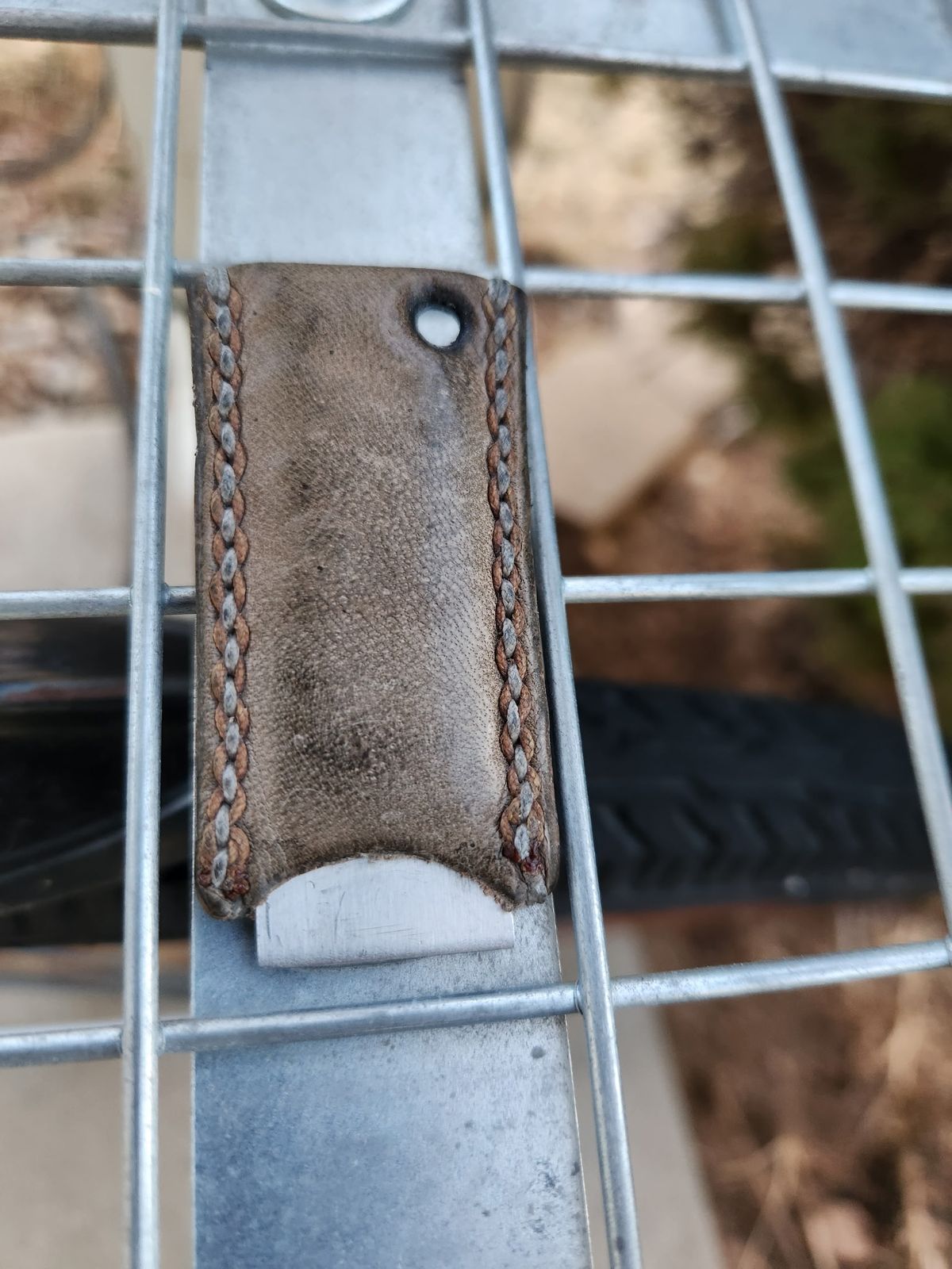 Photo by spyder550 on February 5, 2026 of the Self-Made Keychain/Bottle Opener in Wickett & Craig Grey Traditional Harness.