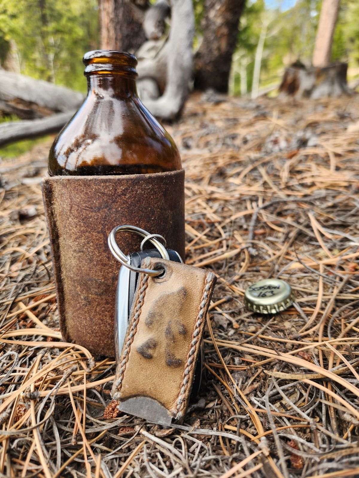 Photo by spyder550 on April 5, 2026 of the Self-Made Keychain/Bottle Opener in Wickett & Craig Grey Traditional Harness.