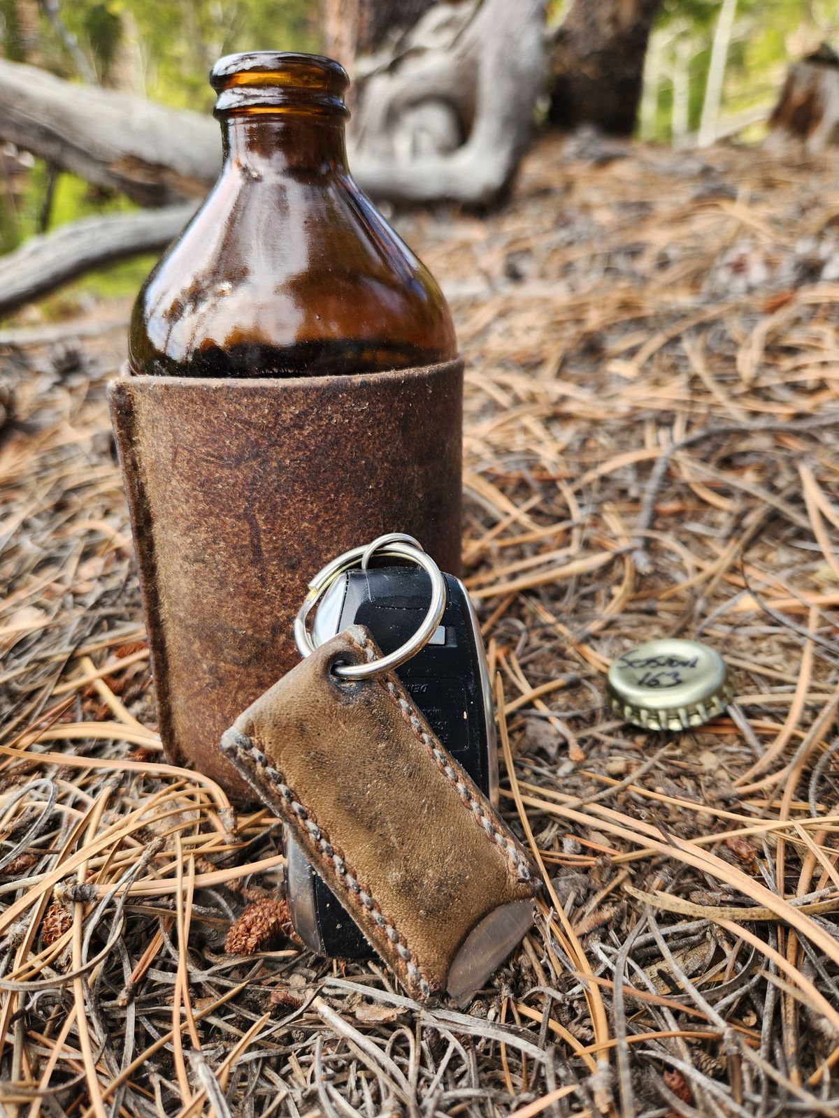 Photo by spyder550 on April 5, 2026 of the Self-Made Keychain/Bottle Opener in Wickett & Craig Grey Traditional Harness.