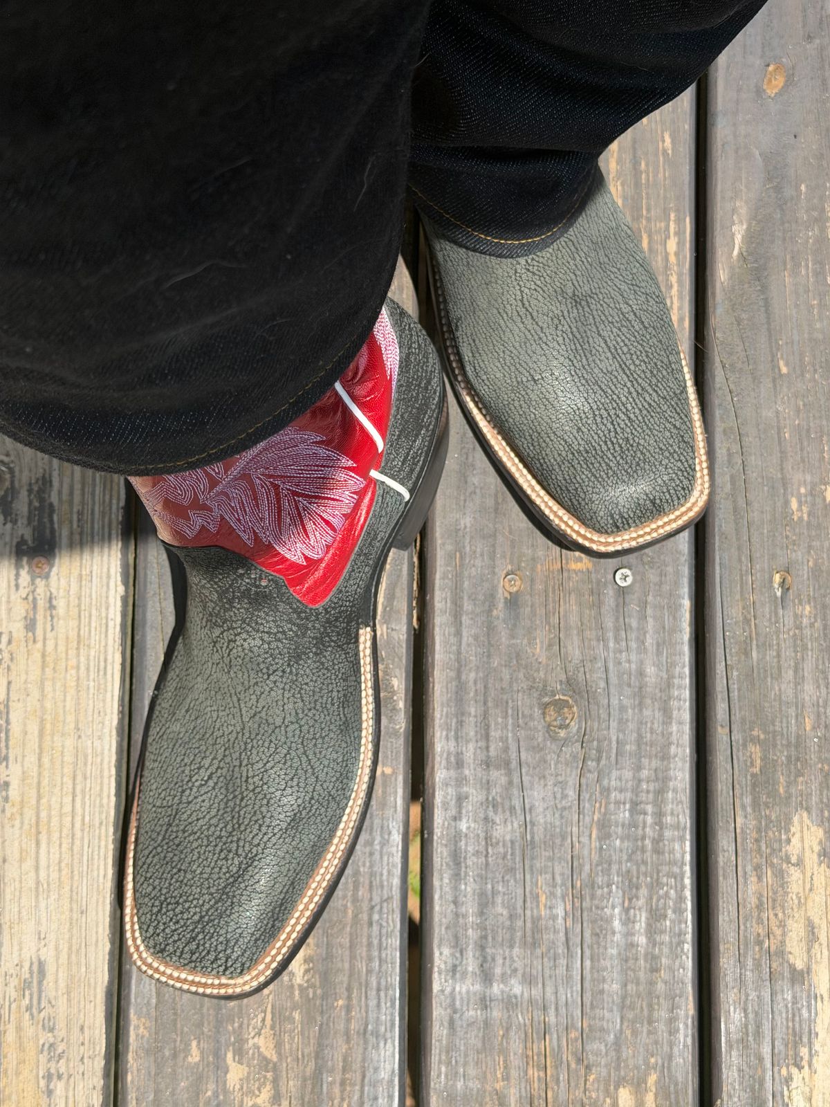 Photo by BigDawg308 on June 27, 2026 of the Rios of Mercedes Cowboy Boots in Black Poseidon Goat & Maraschino Red Kidskin.