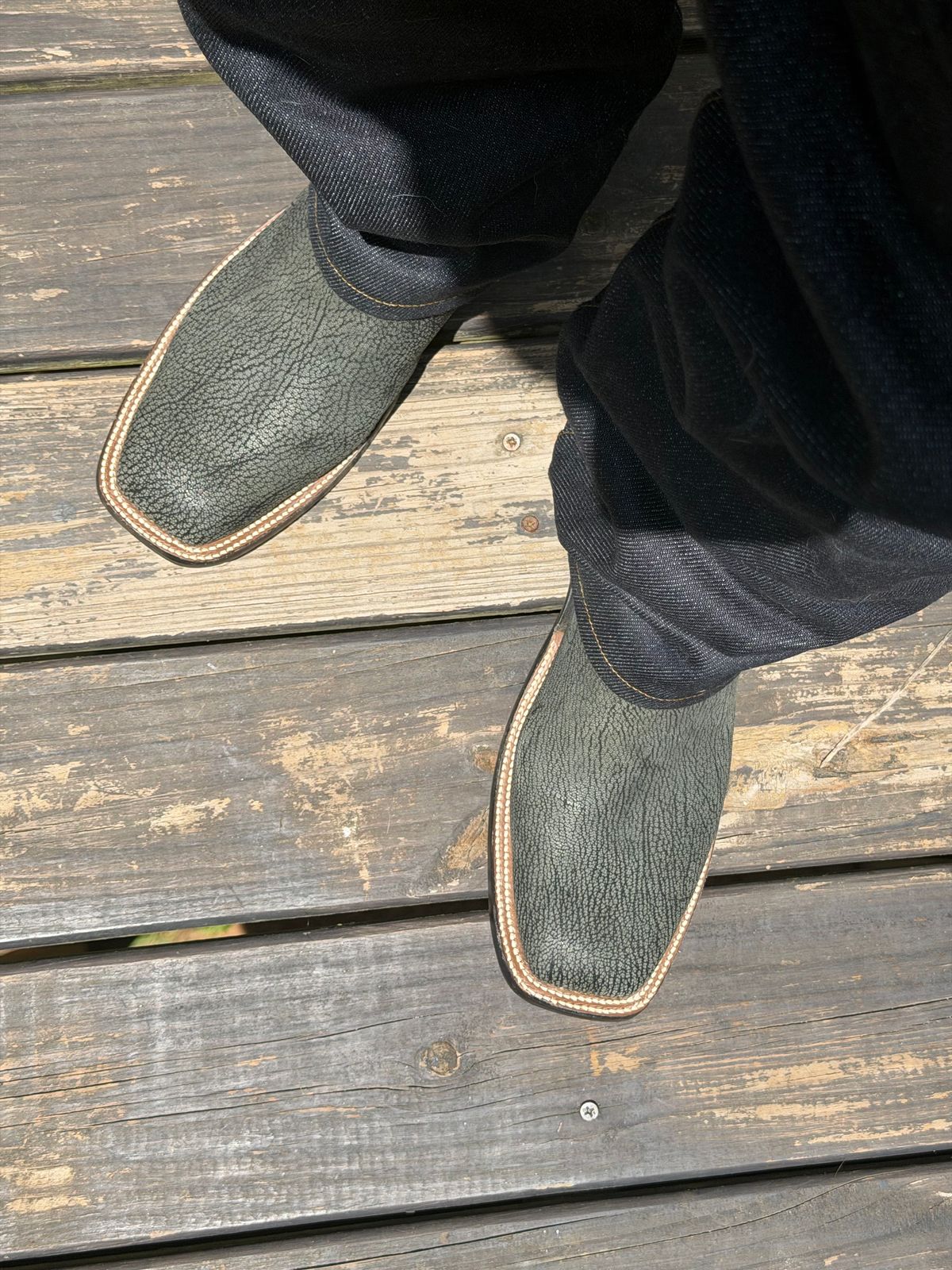 Photo by BigDawg308 on June 27, 2026 of the Rios of Mercedes Cowboy Boots in Black Poseidon Goat & Maraschino Red Kidskin.