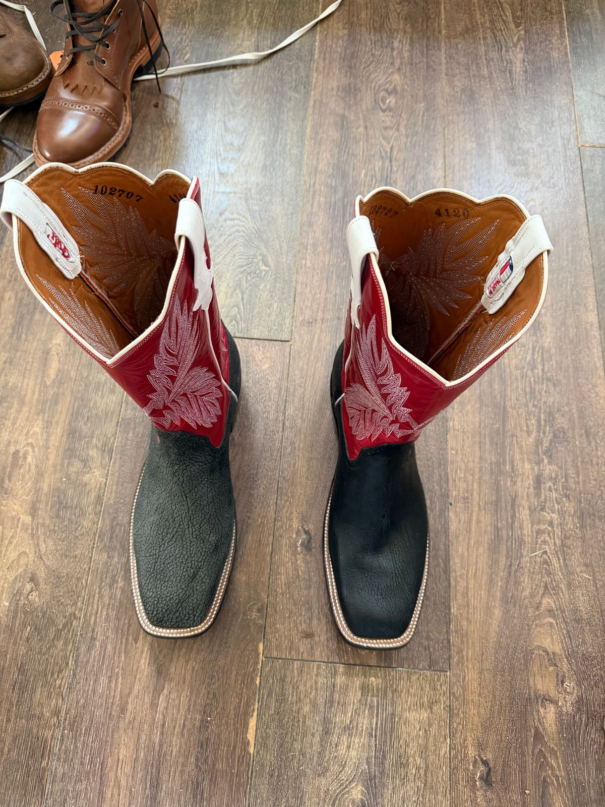 Photo by BigDawg308 on June 29, 2026 of the Rios of Mercedes Cowboy Boots in Black Poseidon Goat & Maraschino Red Kidskin.