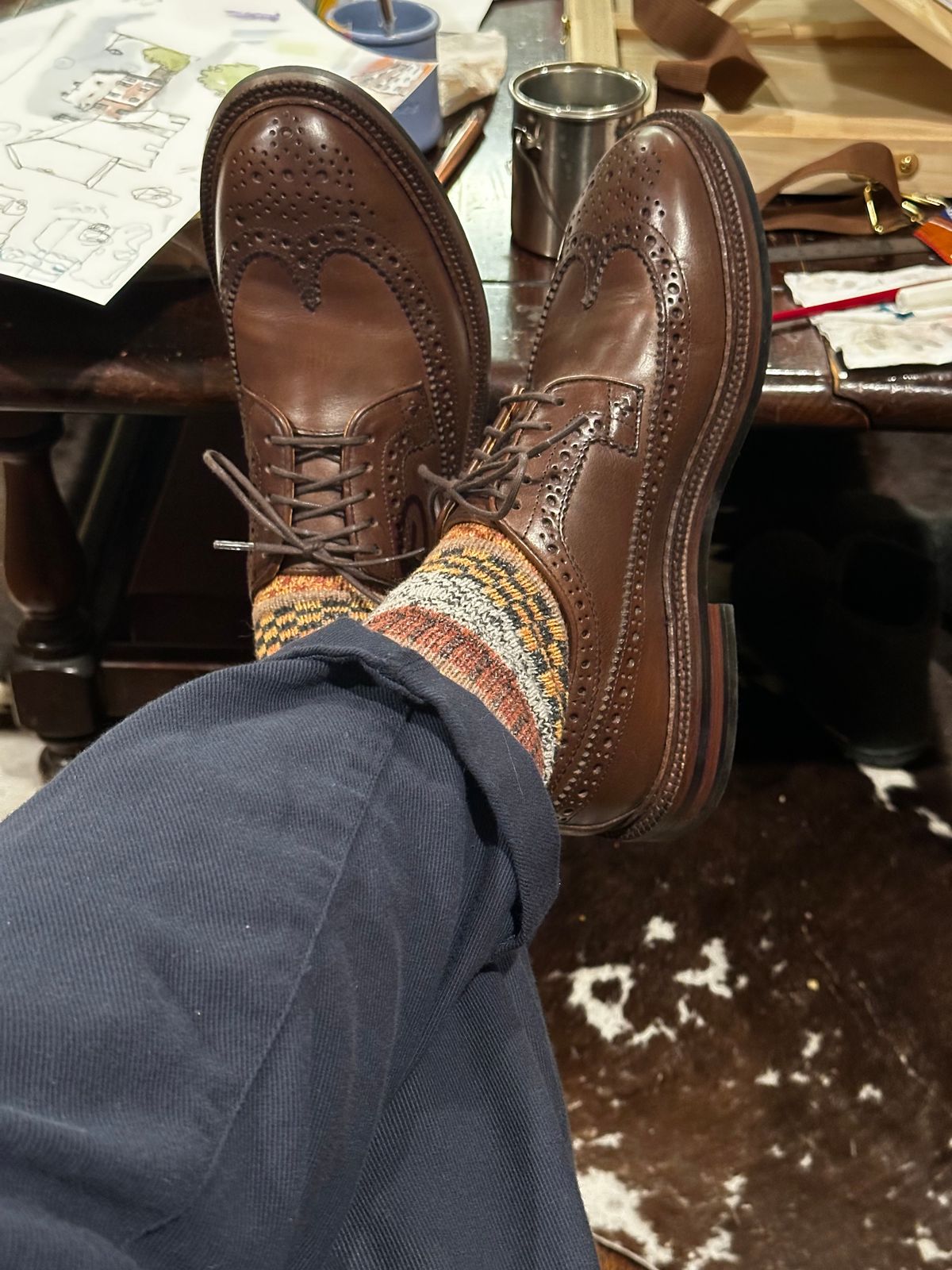 Photo by icarus on January 14, 2025 of the Grant Stone Longwing in Horween Crimson Chromexcel.