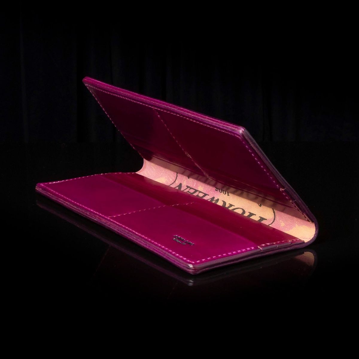 Photo by Huntsman on July 23, 2025 of the Ashland Leather Long Wallet in Horween Ultraviolet Shell Cordovan.