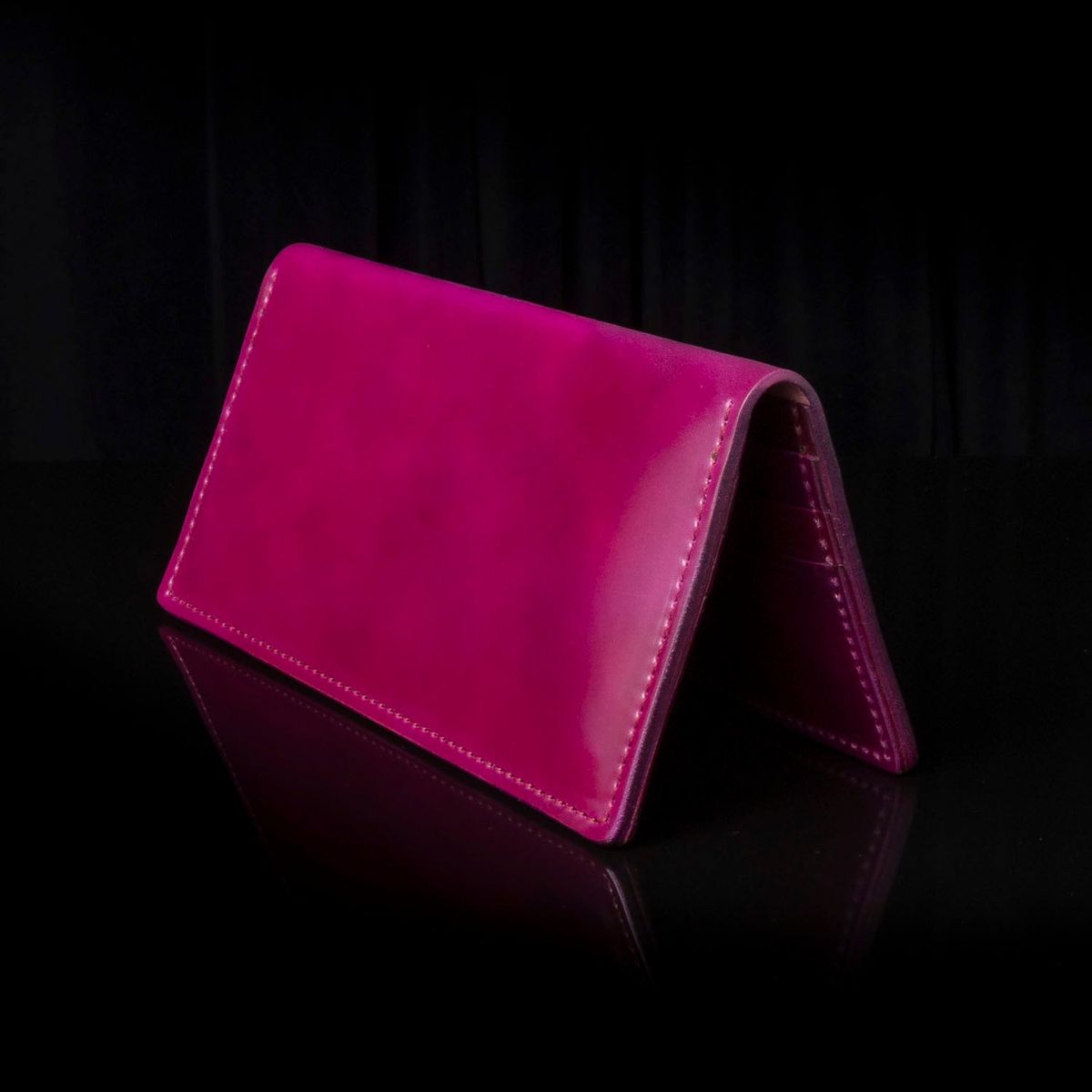 Photo by Huntsman on July 23, 2025 of the Ashland Leather Long Wallet in Horween Ultraviolet Shell Cordovan.
