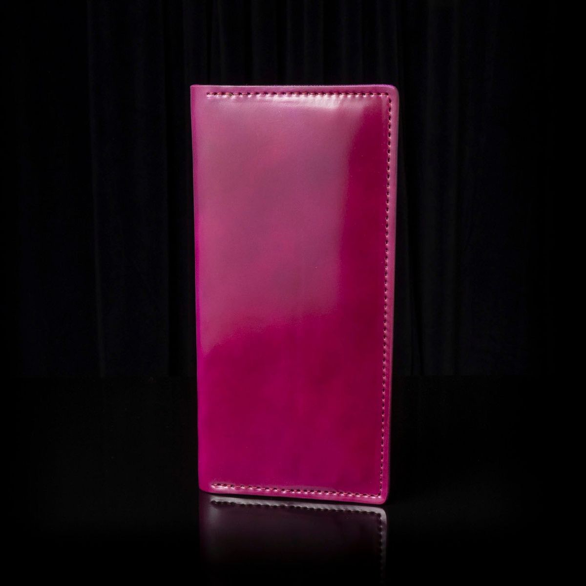 Photo by Huntsman on July 23, 2025 of the Ashland Leather Long Wallet in Horween Ultraviolet Shell Cordovan.
