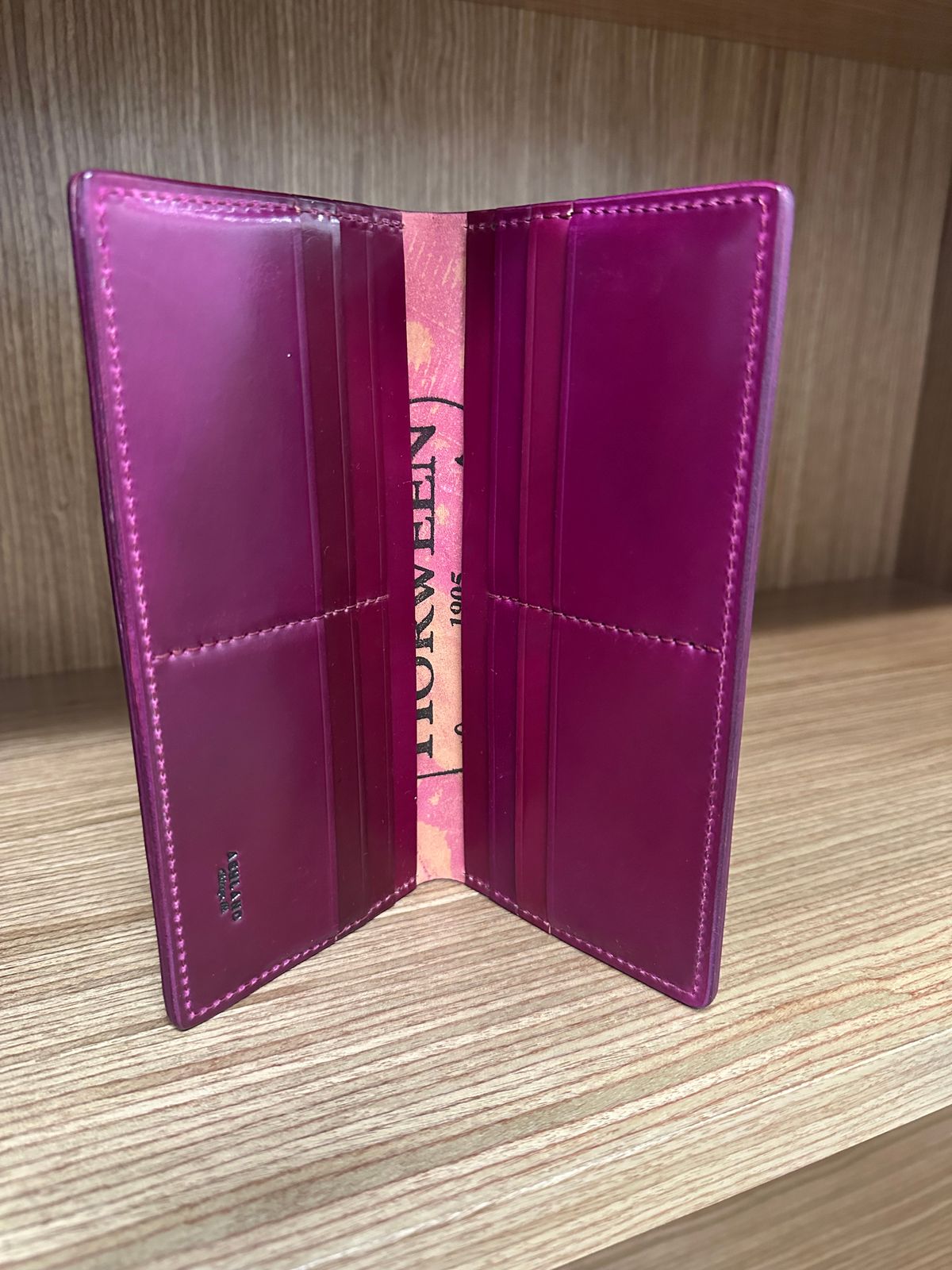 Photo by Huntsman on November 6, 2025 of the Ashland Leather Long Wallet in Horween Ultraviolet Shell Cordovan.