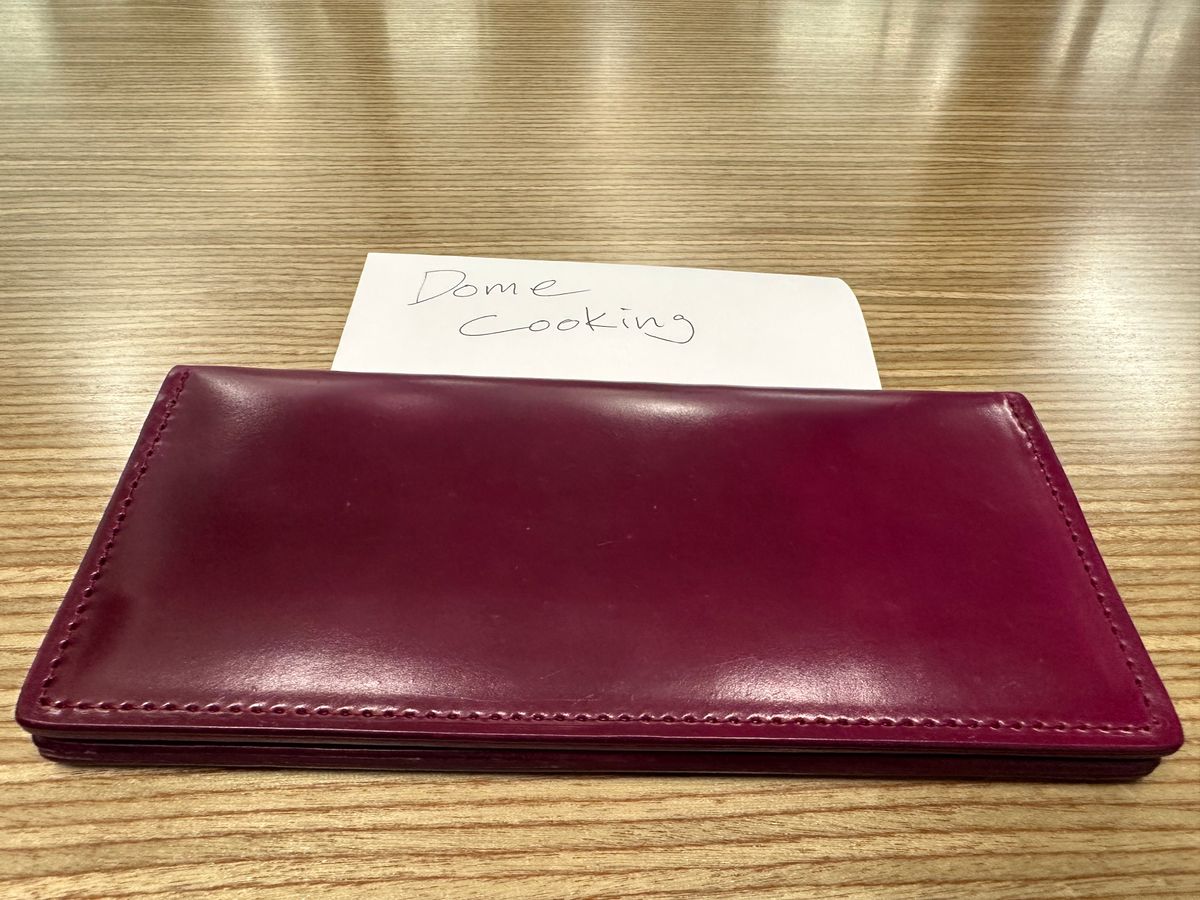 Photo by Huntsman on November 6, 2025 of the Ashland Leather Long Wallet in Horween Ultraviolet Shell Cordovan.