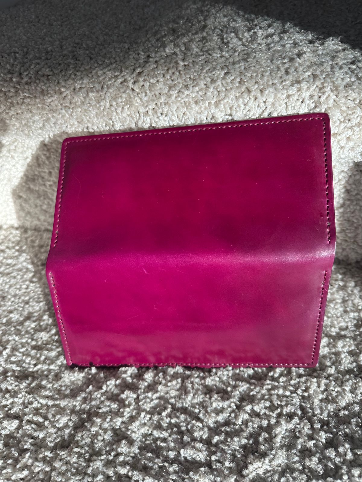 Photo by Huntsman on February 5, 2026 of the Ashland Leather Long Wallet in Horween Ultraviolet Shell Cordovan.
