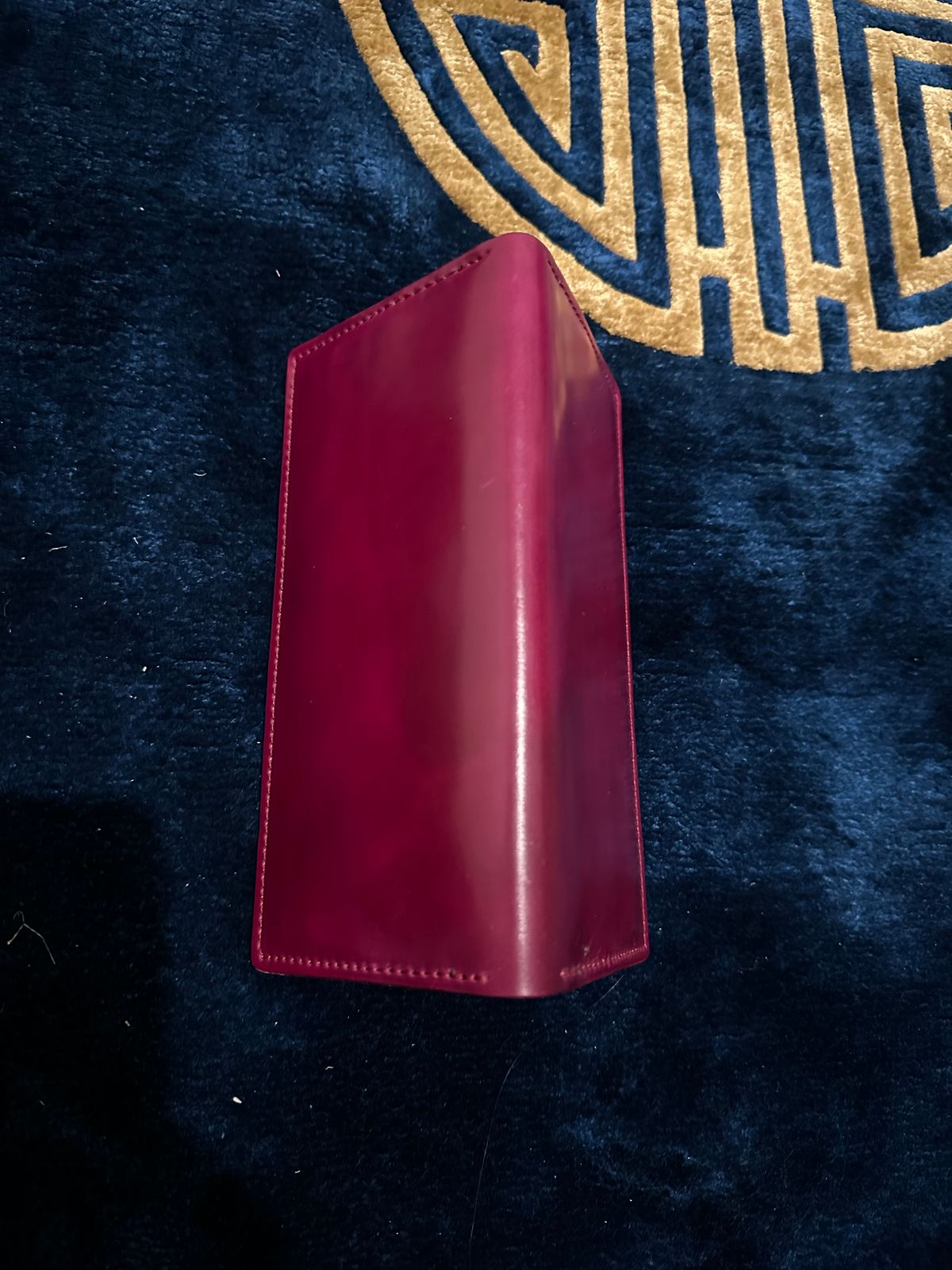 Photo by Huntsman on April 6, 2026 of the Ashland Leather Long Wallet in Horween Ultraviolet Shell Cordovan.