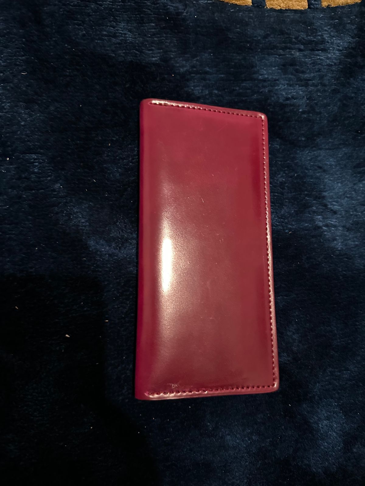 Photo by Huntsman on April 6, 2026 of the Ashland Leather Long Wallet in Horween Ultraviolet Shell Cordovan.