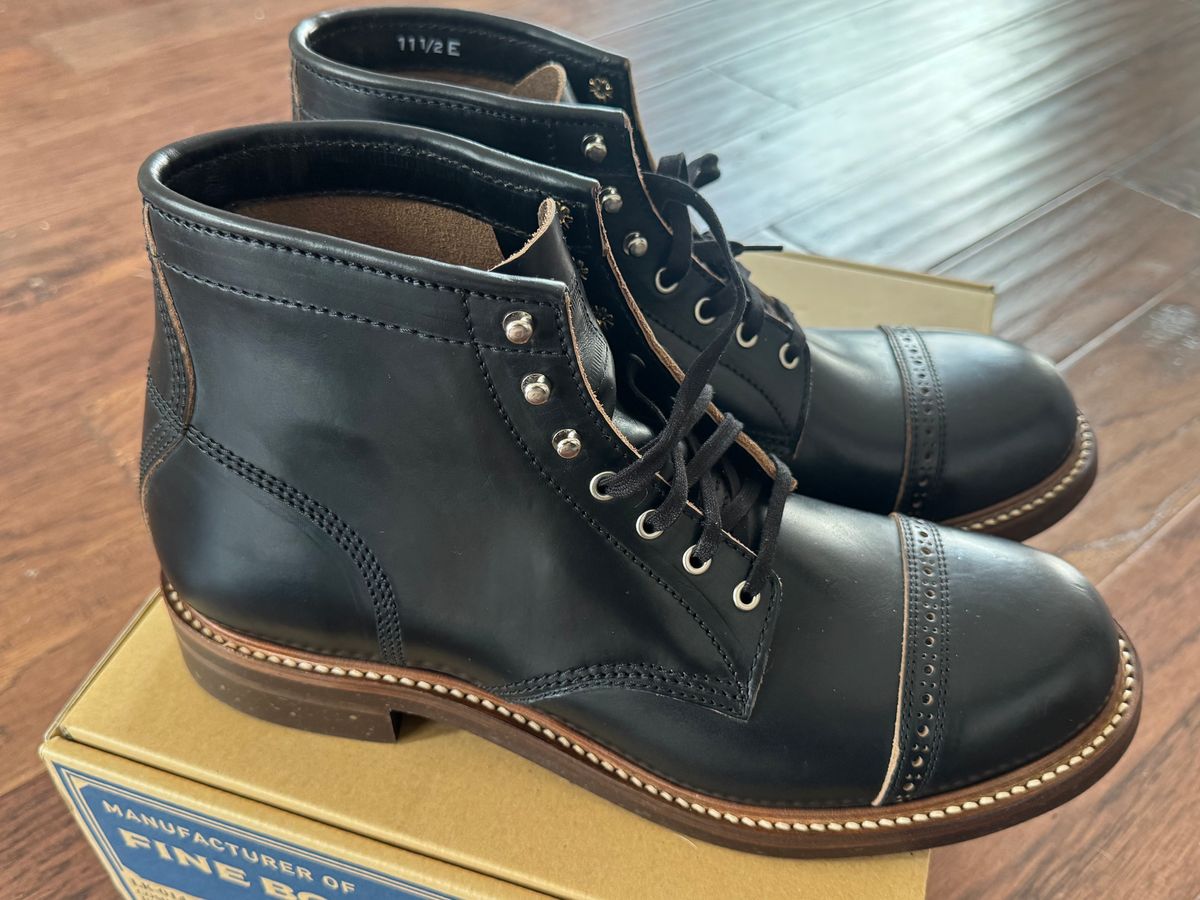 Photo by BamaBoyinTx on January 17, 2025 of the John Lofgren Combat Boots in Horween Black Chromexcel.