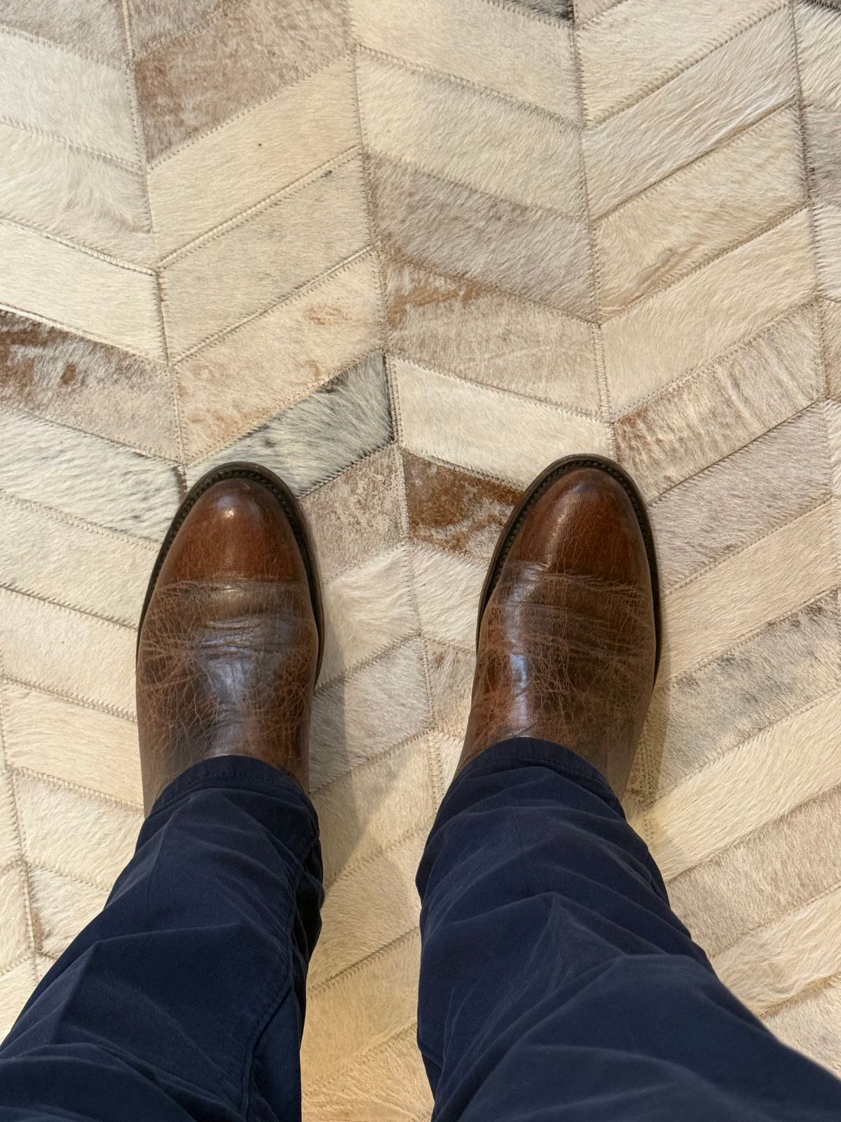 Photo by JHOUSTON on April 17, 2025 of the Lucchese Cowboy Boots in Tusting and Burnett Mad Dog Goat.