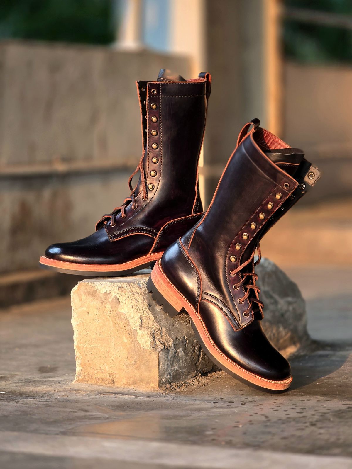 Photo by julio_archieve on October 5, 2025 of the Fortis Boots Logger Boots in Indonesian Red Brown Pull Up Overdyed Black.